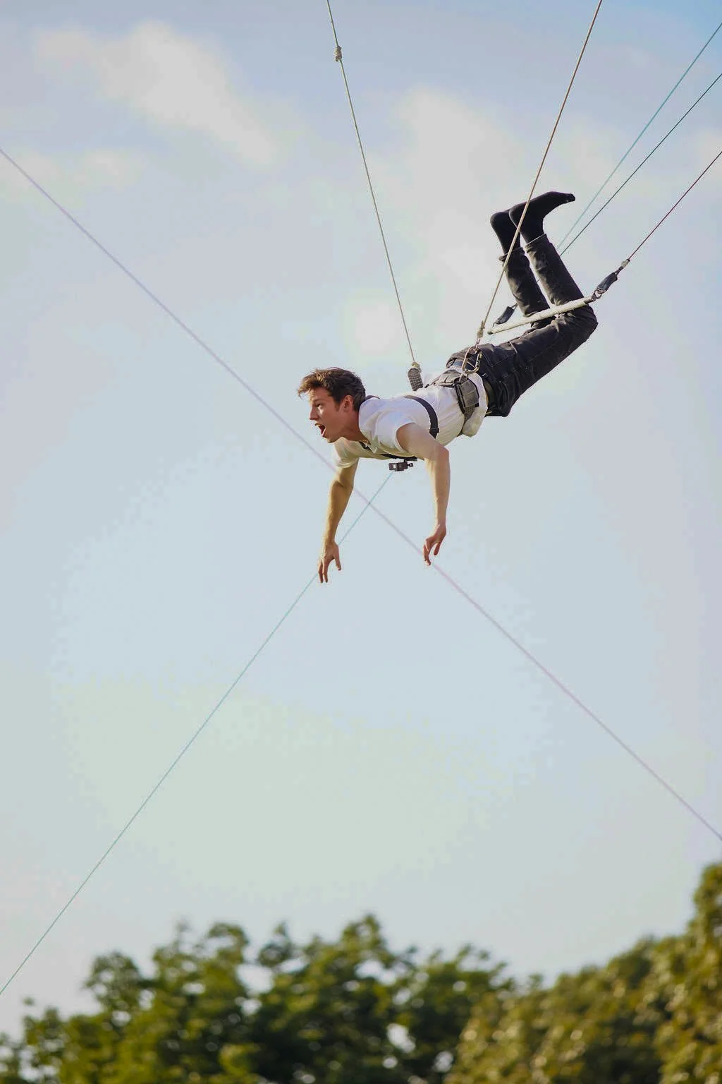 Nolan on a flying trapeze at Oheka Castle