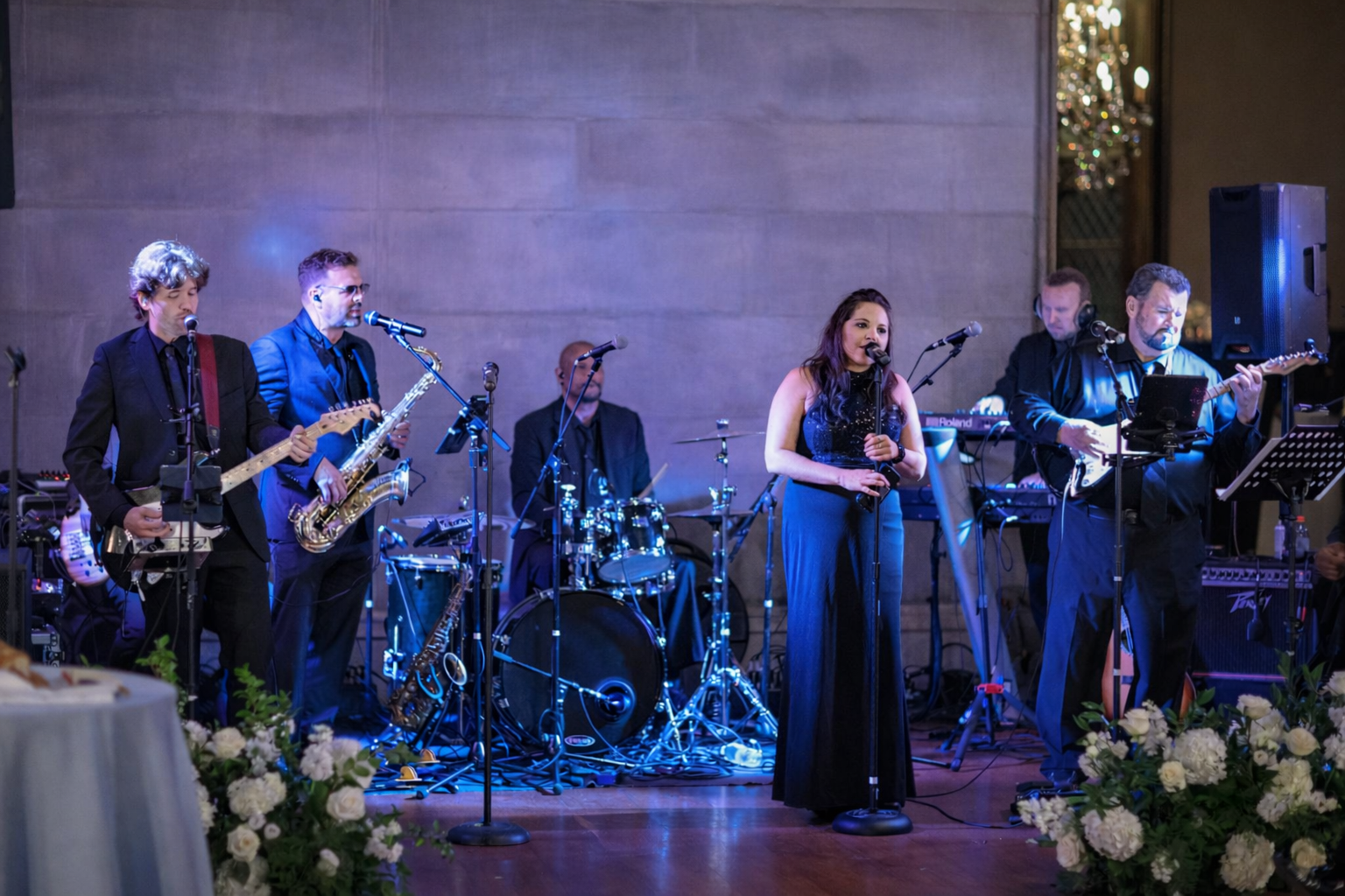 Live wedding band performing during reception at Hempstead House Sands Point Preserve