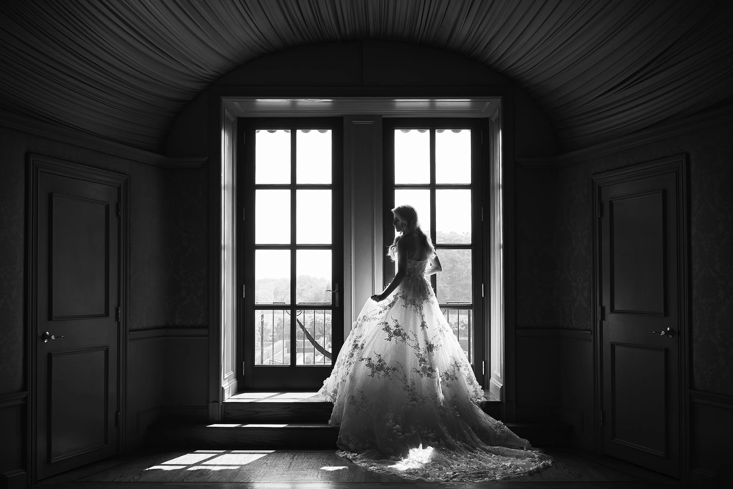 Black and white bridal silhouette bridal suite balcony doors at Oheka Castle