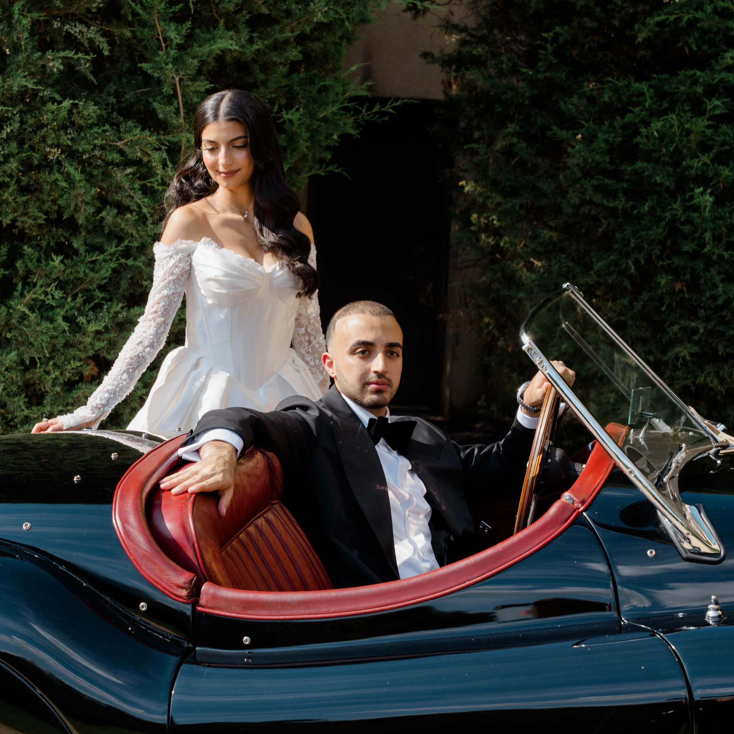 Bride and Groom Portrait in a 1953 Jaguar XK120 , Oheka Castle