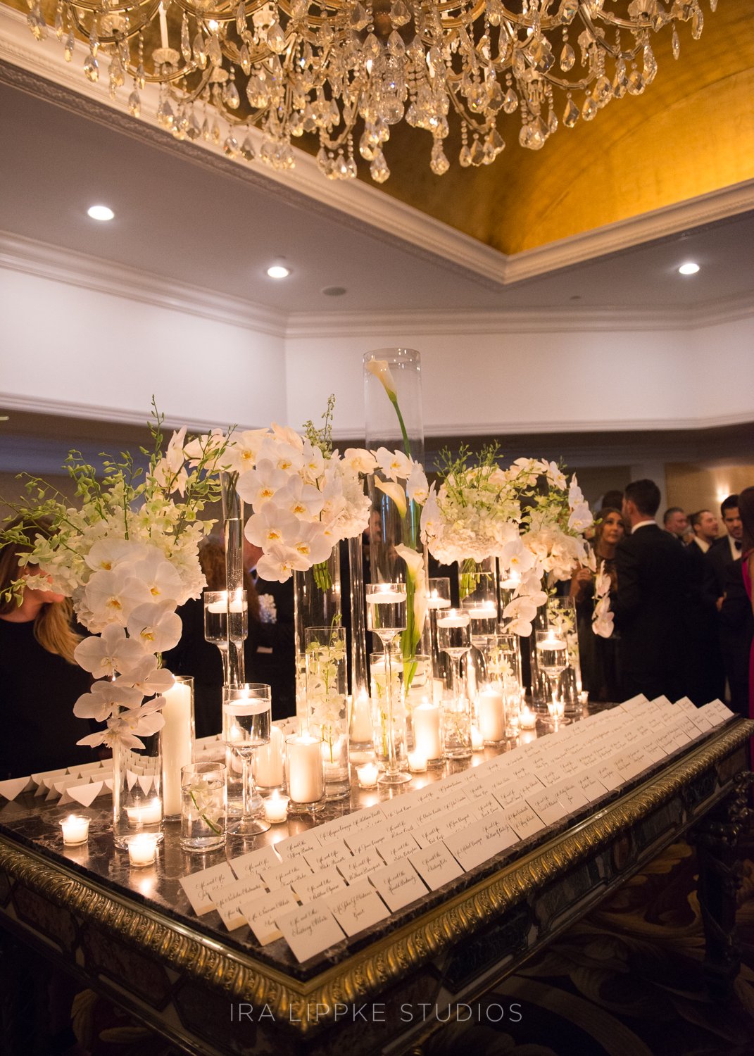 A beautifully styled reception table featuring lush floral arrangements, candlelight, and carefully curated décor that set the tone for the evening.