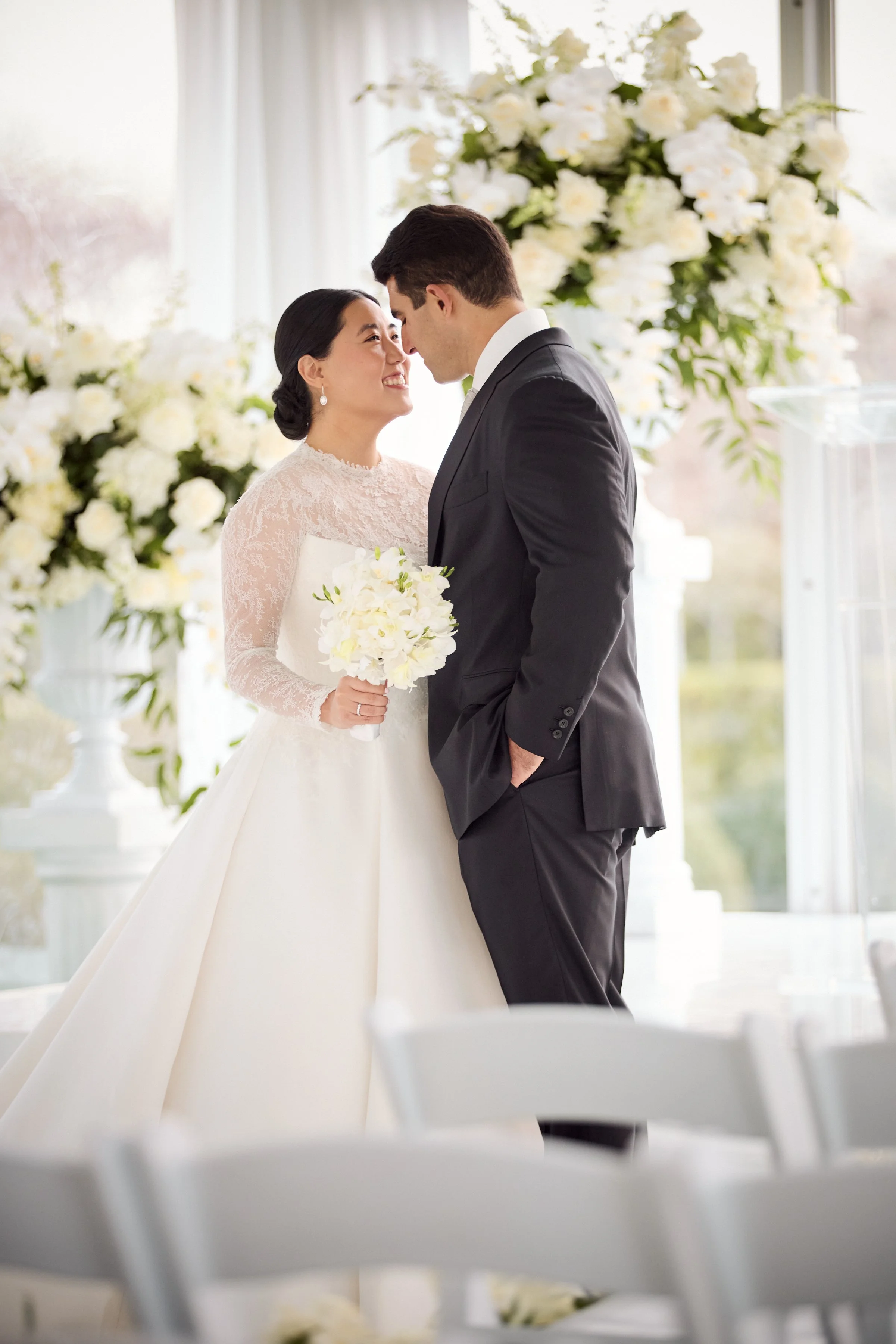 A quiet, romantic portrait capturing the couple in a moment of calm and connection.