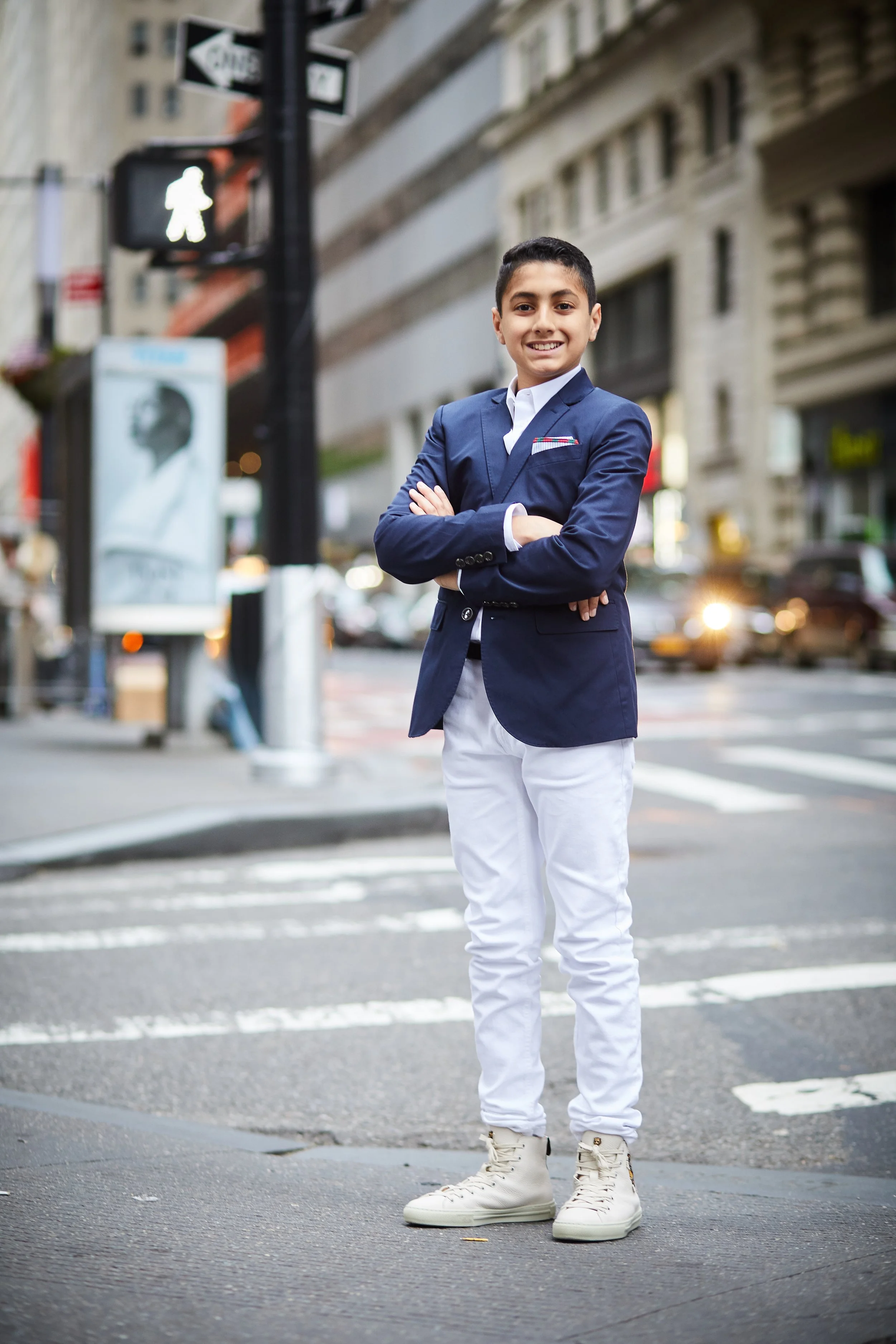 Bar Mitzvah portrait of Skyler on a New York City street near Cipriani Wall Street — a confident, modern moment capturing his personality against the energy and rhythm of downtown Manhattan.
