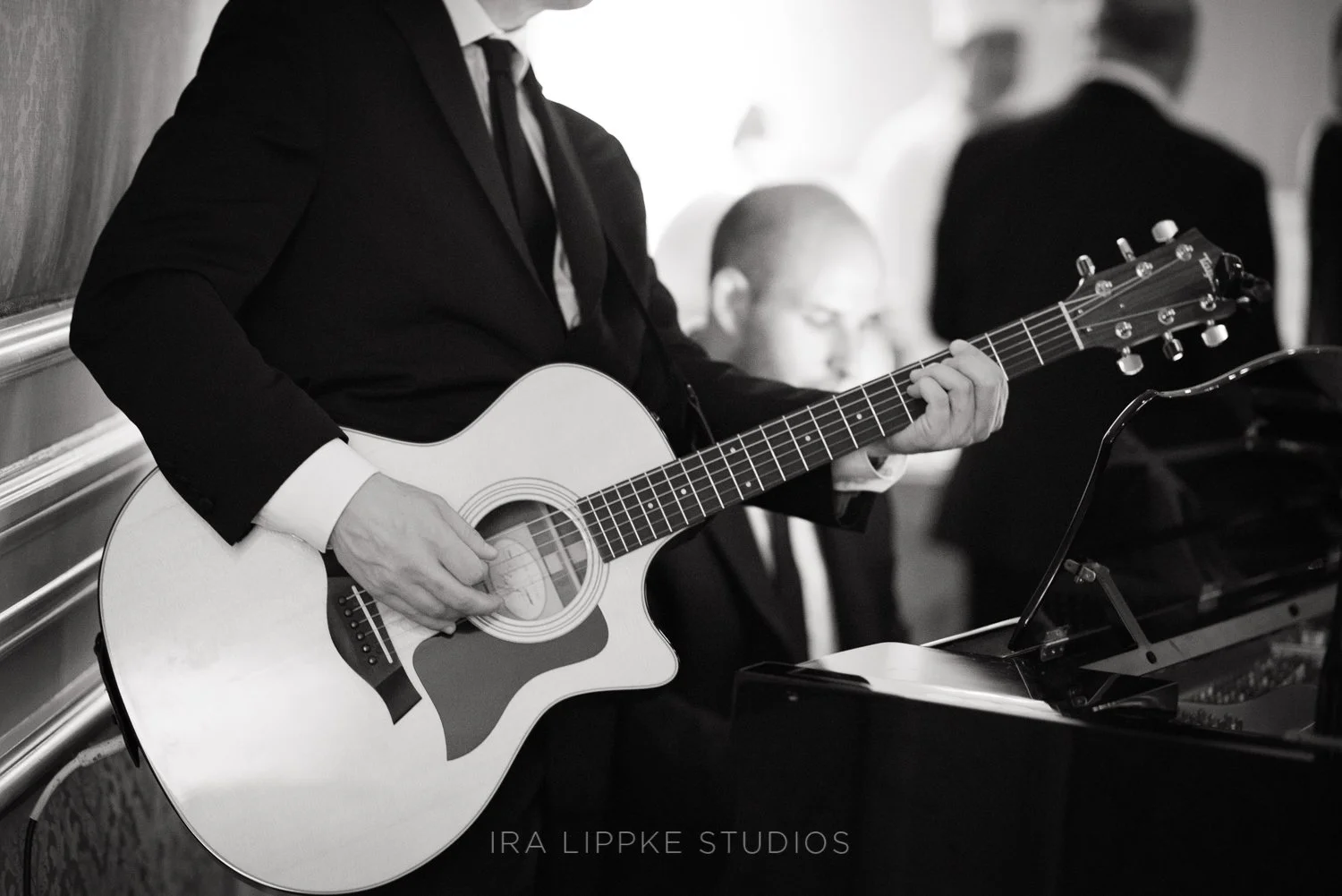 A musician performs during cocktail hour, adding energy and ambiance to the evening's festivities.
