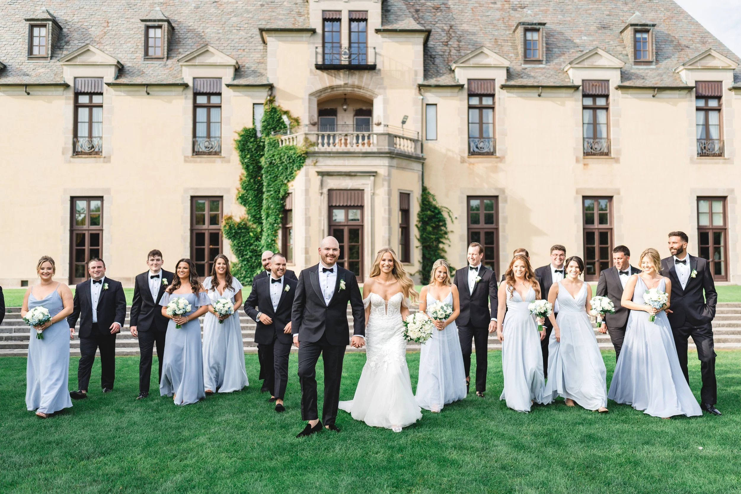 bridal-party-walking-oheka-castle.jpg.jpg