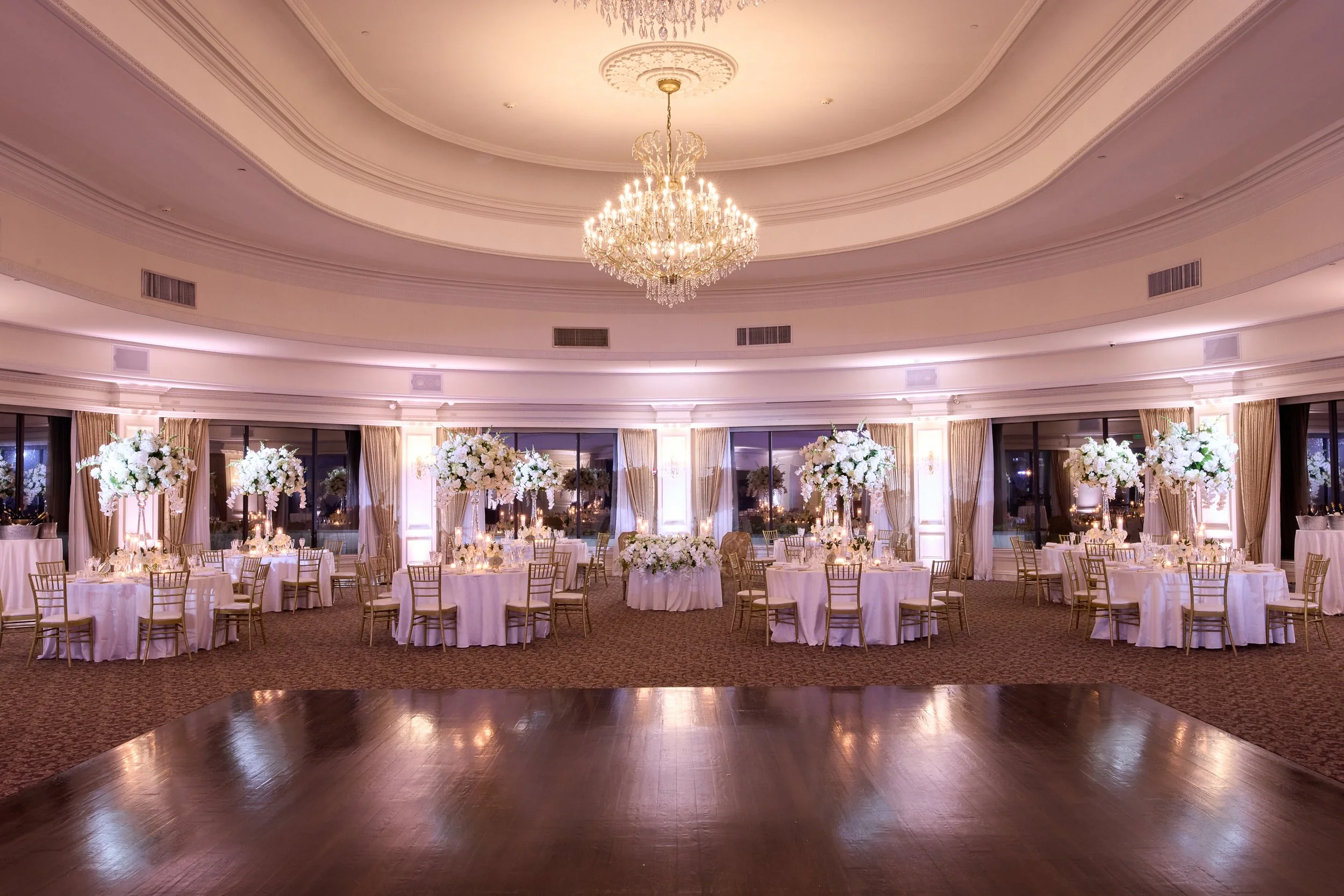 A grand ballroom reveal, balancing scale with intimacy through thoughtful layout and lighting.
