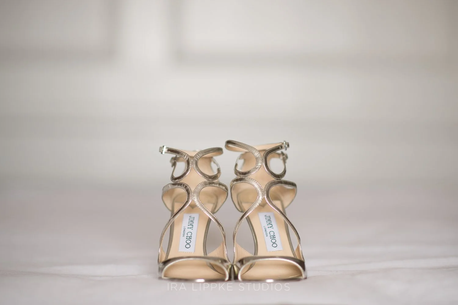 The bride’s designer heels are photographed before the celebration begins, highlighting the thoughtful accessories chosen for the occasion.