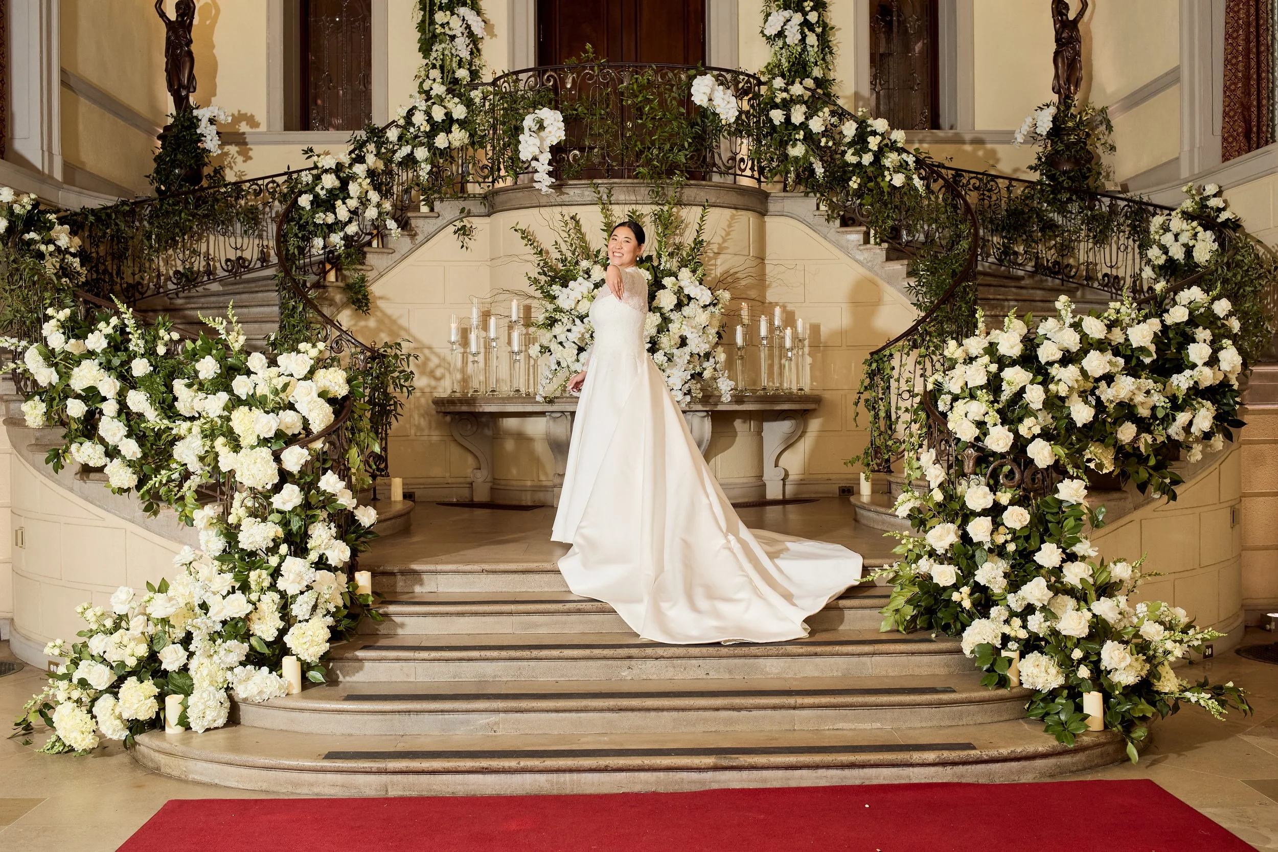 A striking floral installation designed with balance and scale, enhancing the architectural beauty of the space.