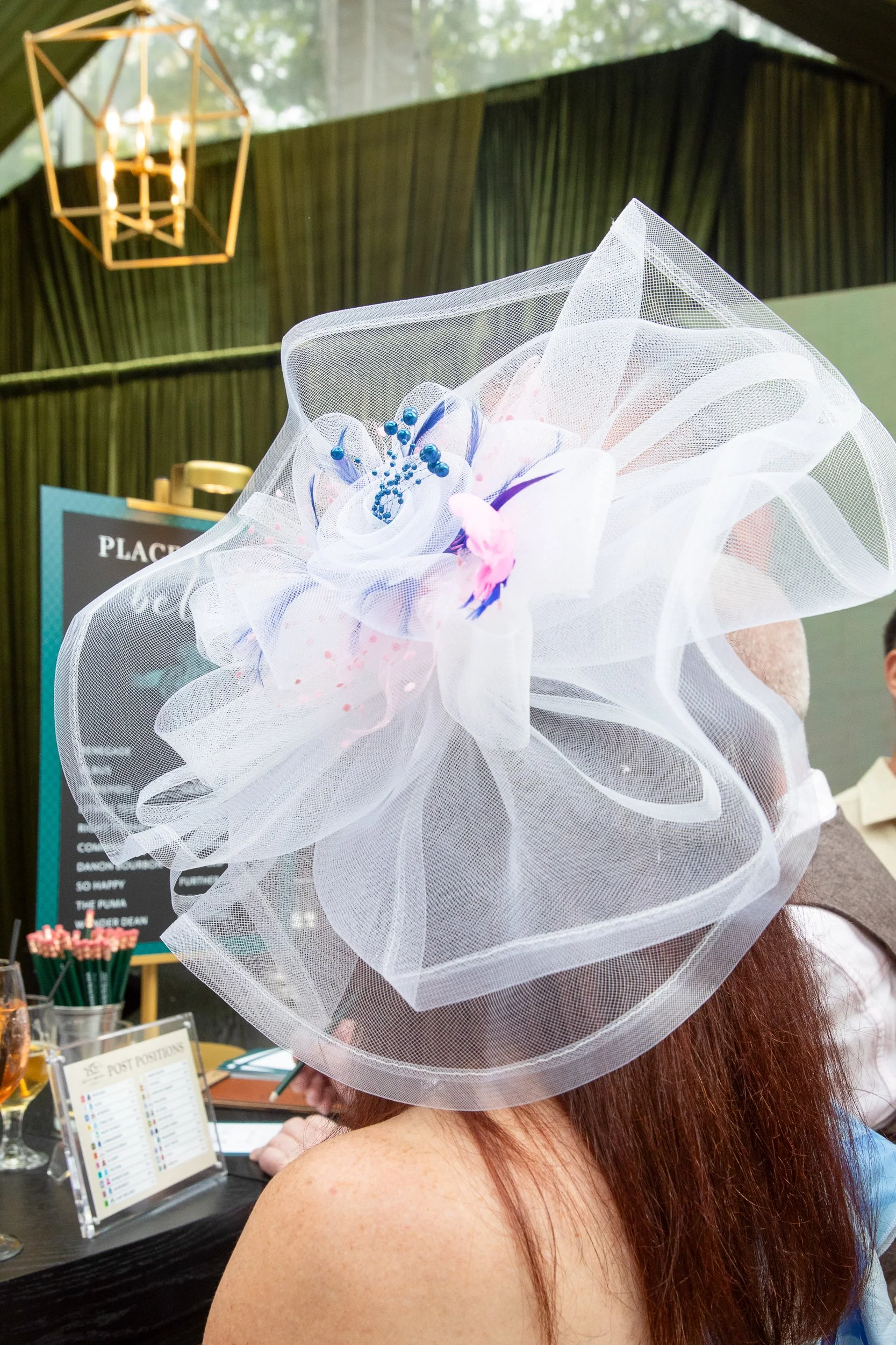 Fascinators, elaborate hats, and race-day fashion details reflected the timeless elegance and playful spirit of the Kentucky Derby.