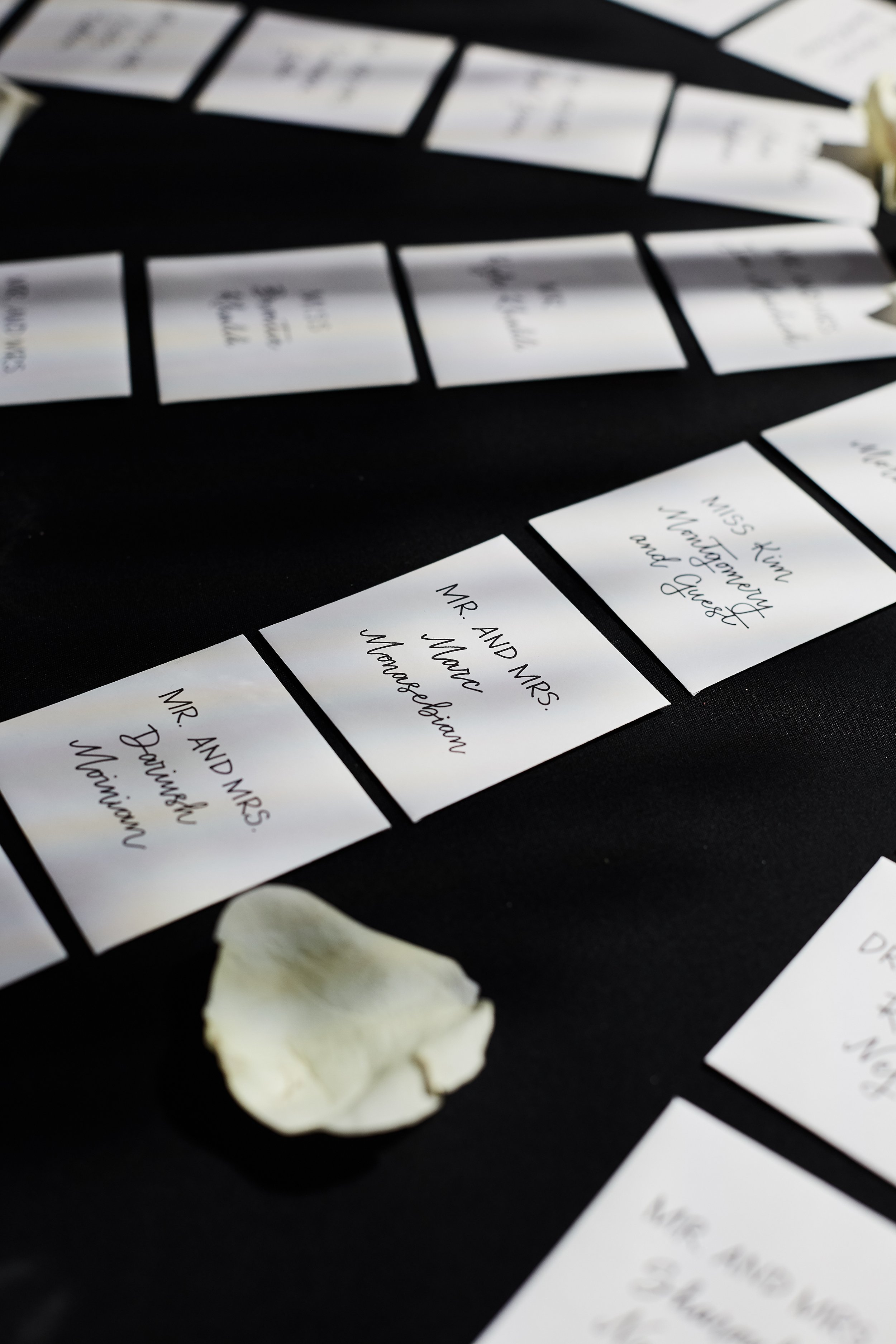 Bar Mitzvah escort cards with custom calligraphy at Cipriani Wall Street in New York City — a refined stationery detail, thoughtfully composed with soft florals and a clean, modern presentation.