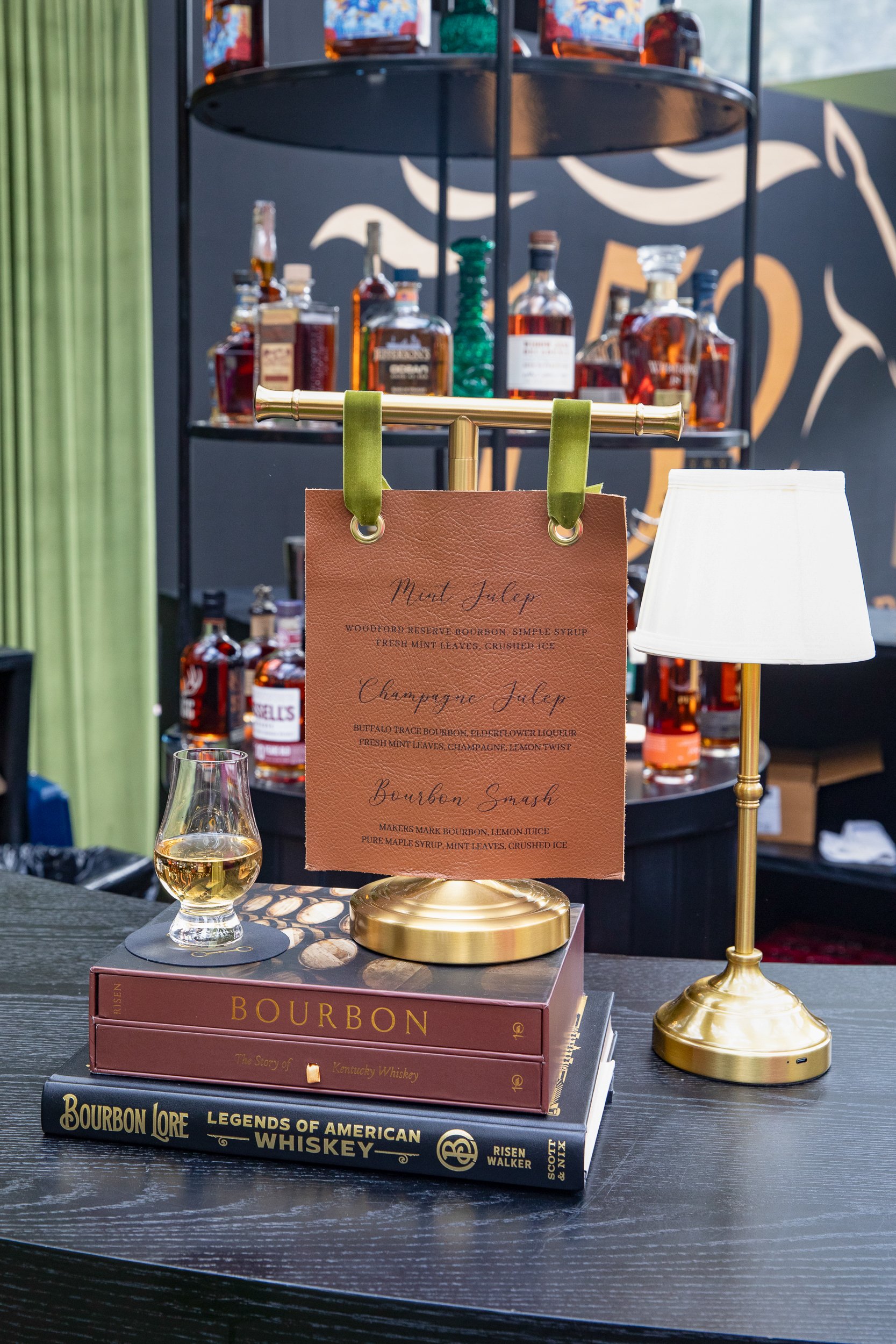 A custom wagering station layered with bourbon service, equestrian details, and Derby-inspired styling moments throughout the celebration.