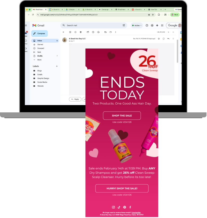 Email inbox on a computer screen with a Valentine's Day-themed advertisement overlay showing a sale on hair care products ending today at 11:59 PM, offering 26% off using code VDAY26.