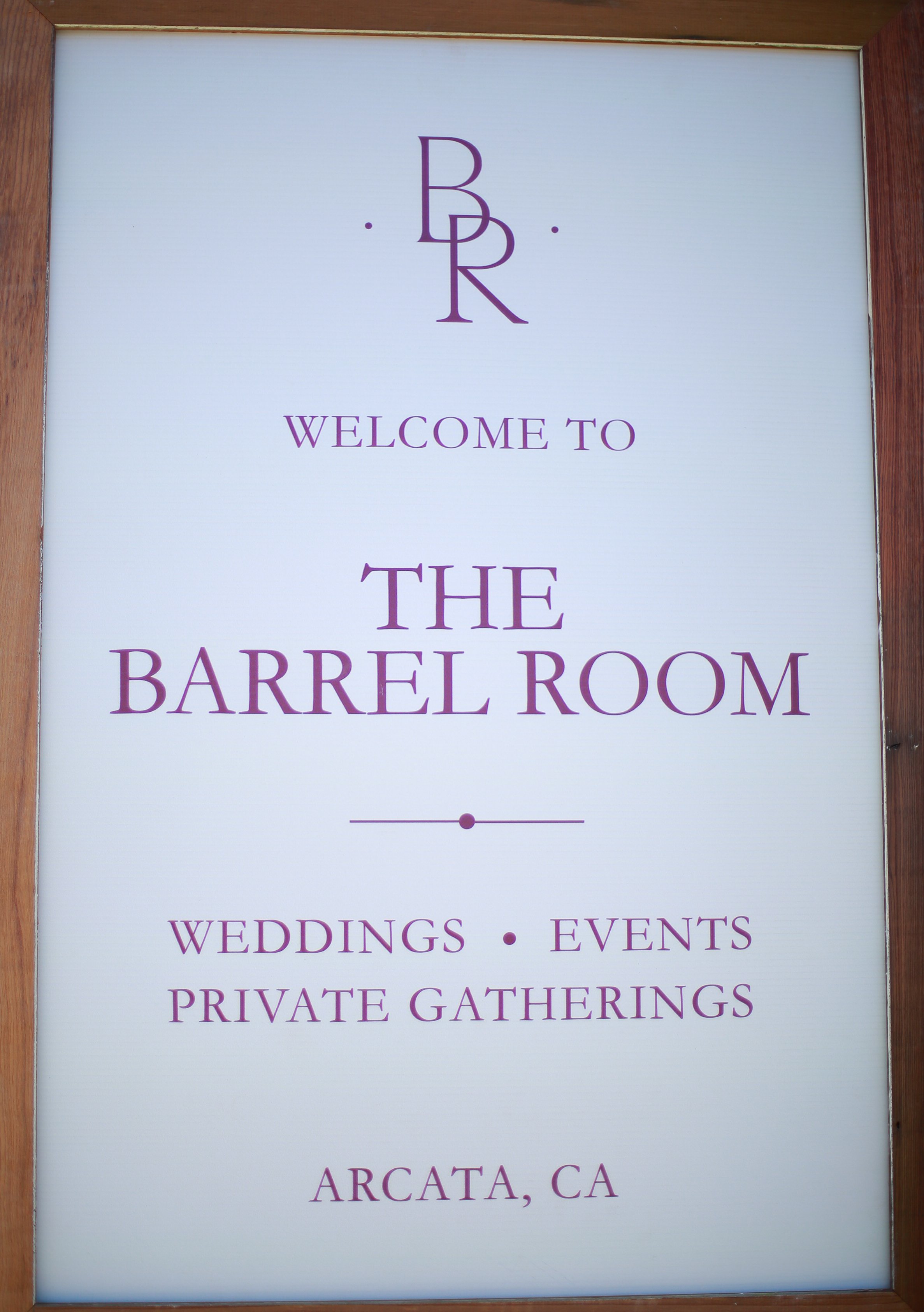 Signboard with the logo 'BB' and text 'Welcome to the Barrel Room' promoting weddings, events, private gatherings at Arcata, CA.