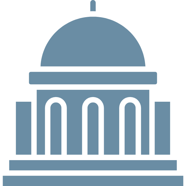 Icon of a government or legislative building with a dome and columns, depicted in blue.