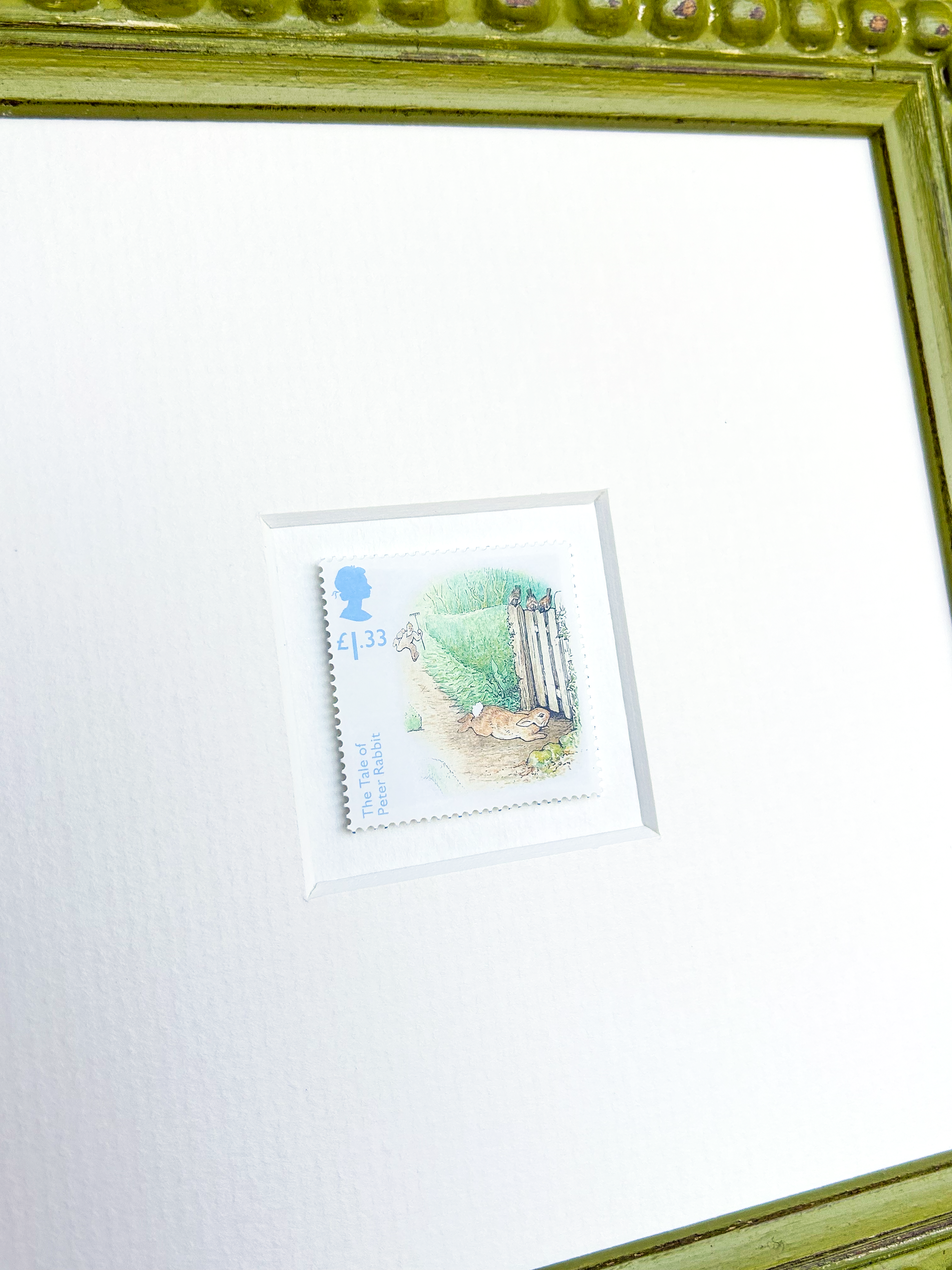peter-rabbit-being-chased-framed-stamp-detail.png