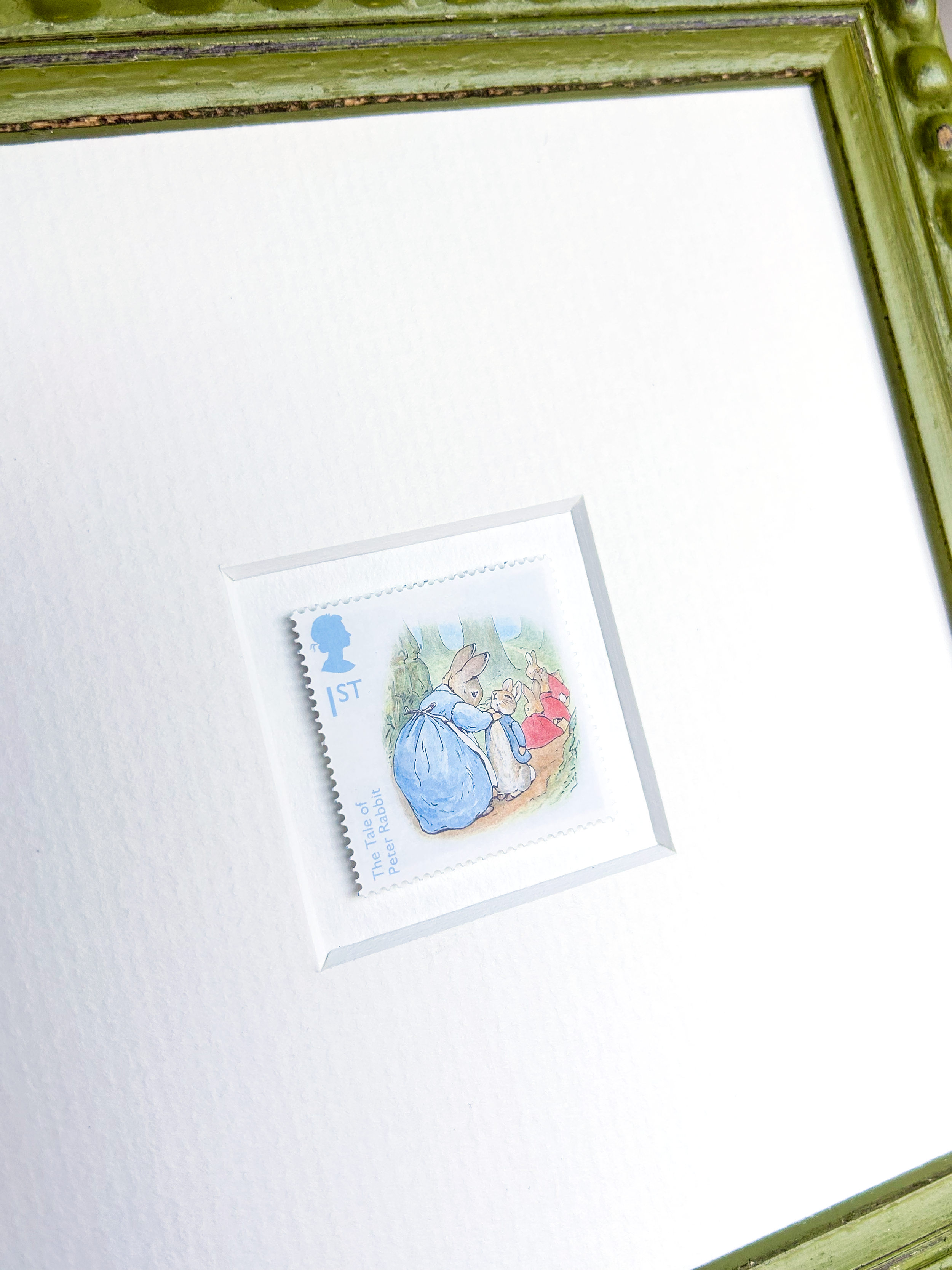 peter-rabbit-buttoning-coat-framed-stamp-detail.png