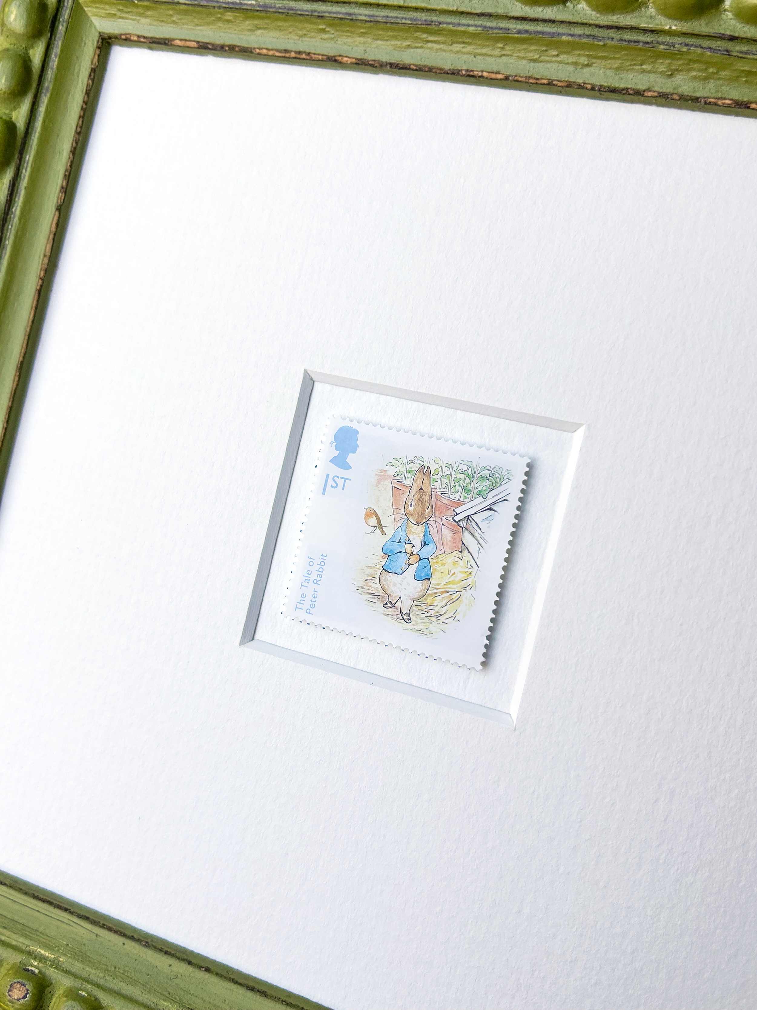 peter-rabbit-in-the-garden-framed-stamp-detail.png
