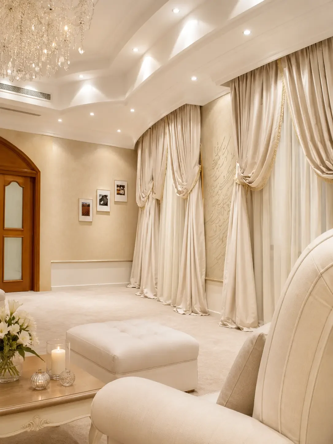 Custom drapery design in a semi-classical Sharjah villa with layered curtains, soft neutral tones, and elegant detailing.