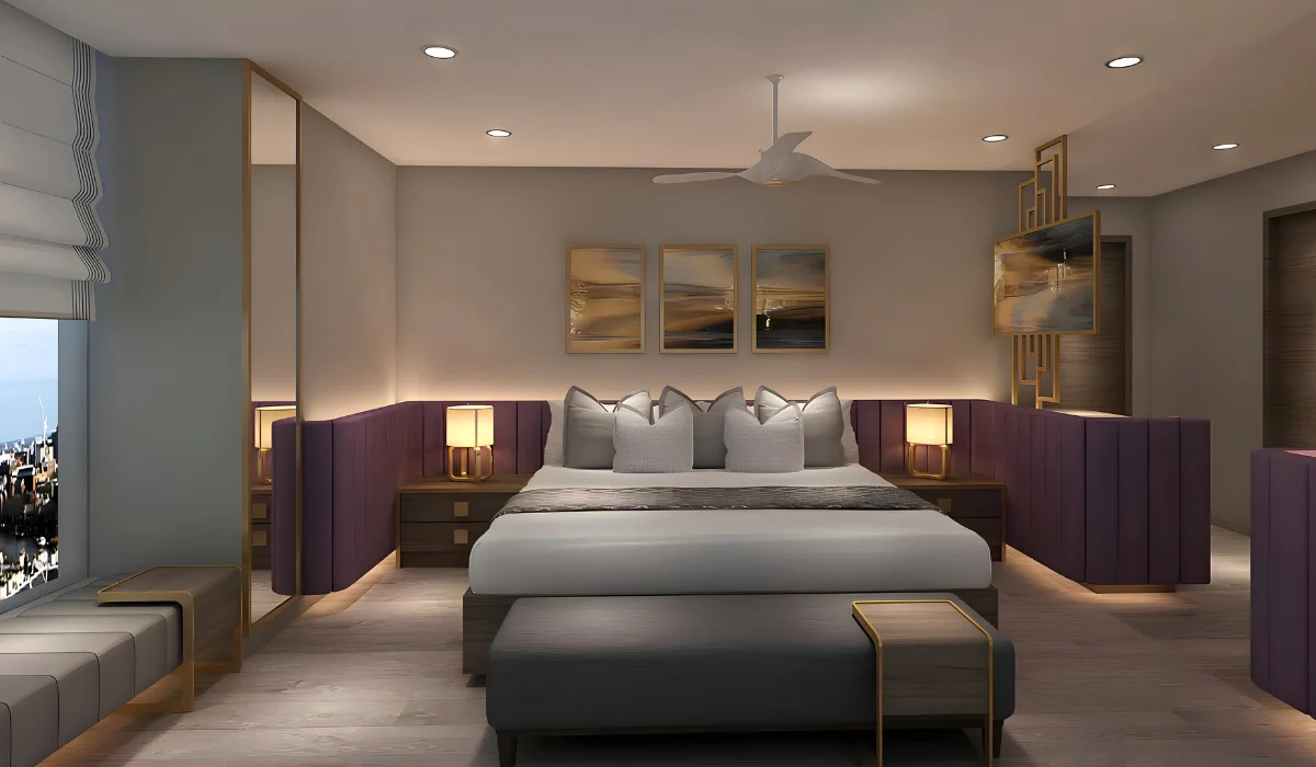 Luxury bedroom with tufted headboard, warm ambient lighting, and soft neutral palette creating a cozy and elegant atmosphere