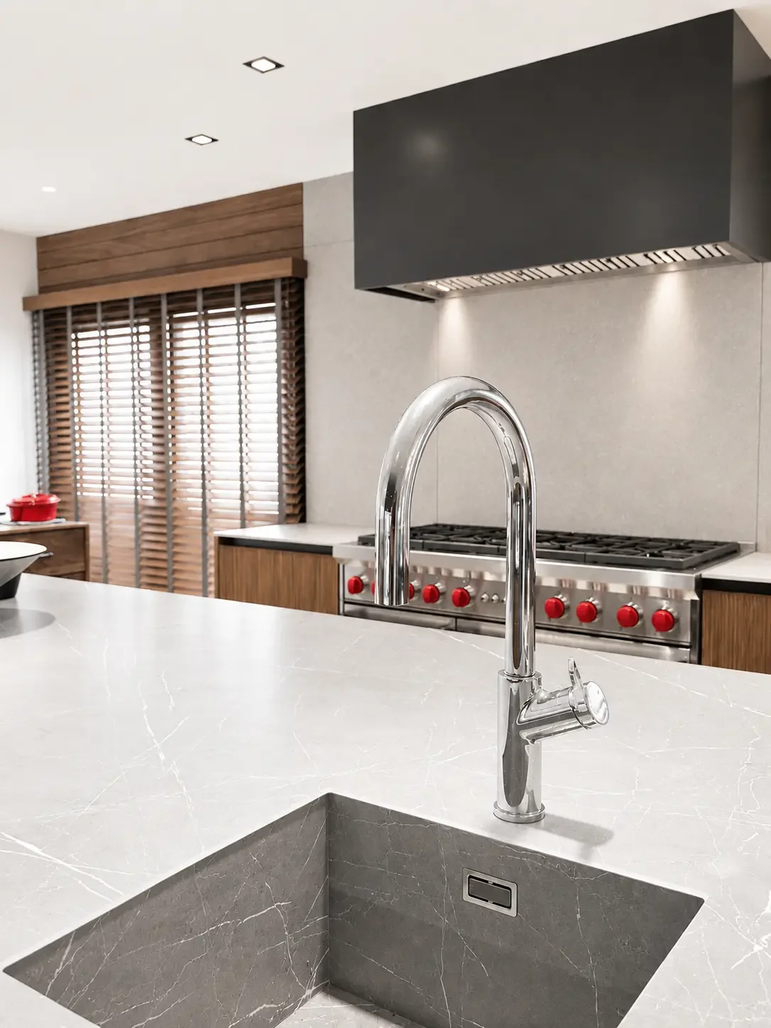 Franklin Lakes NJ kitchen with metal finish island, chrome faucet, and custom Italian cabinetry.