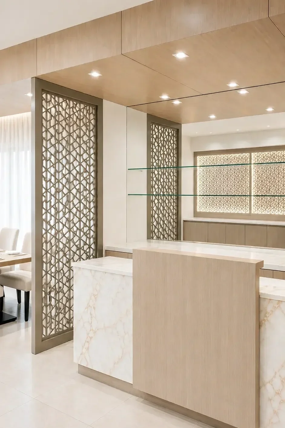 Contemporary restaurant dining area at Royal Falcon Hotel Bur Dubai featuring off-white upholstered chairs and light wood detailing.