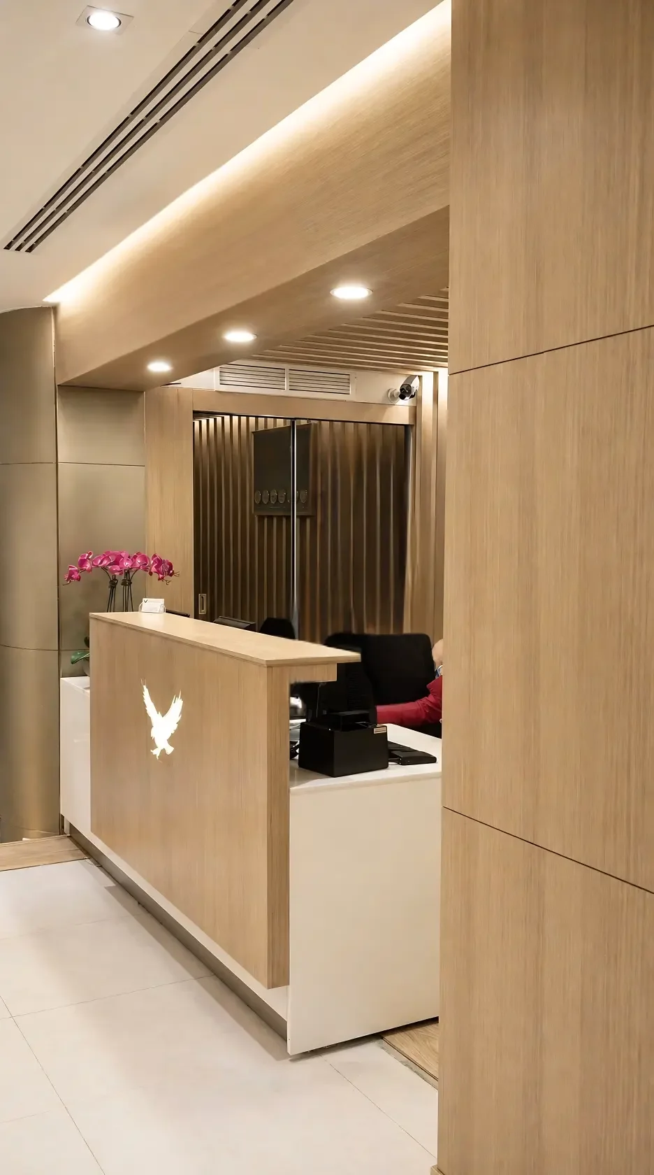 Refined hotel lobby seating area at Royal Falcon Hotel Bur Dubai with soft neutral finishes and contemporary furniture layout