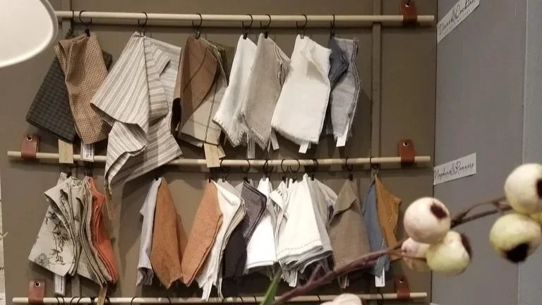 A rack of interior material swatches for upholstery