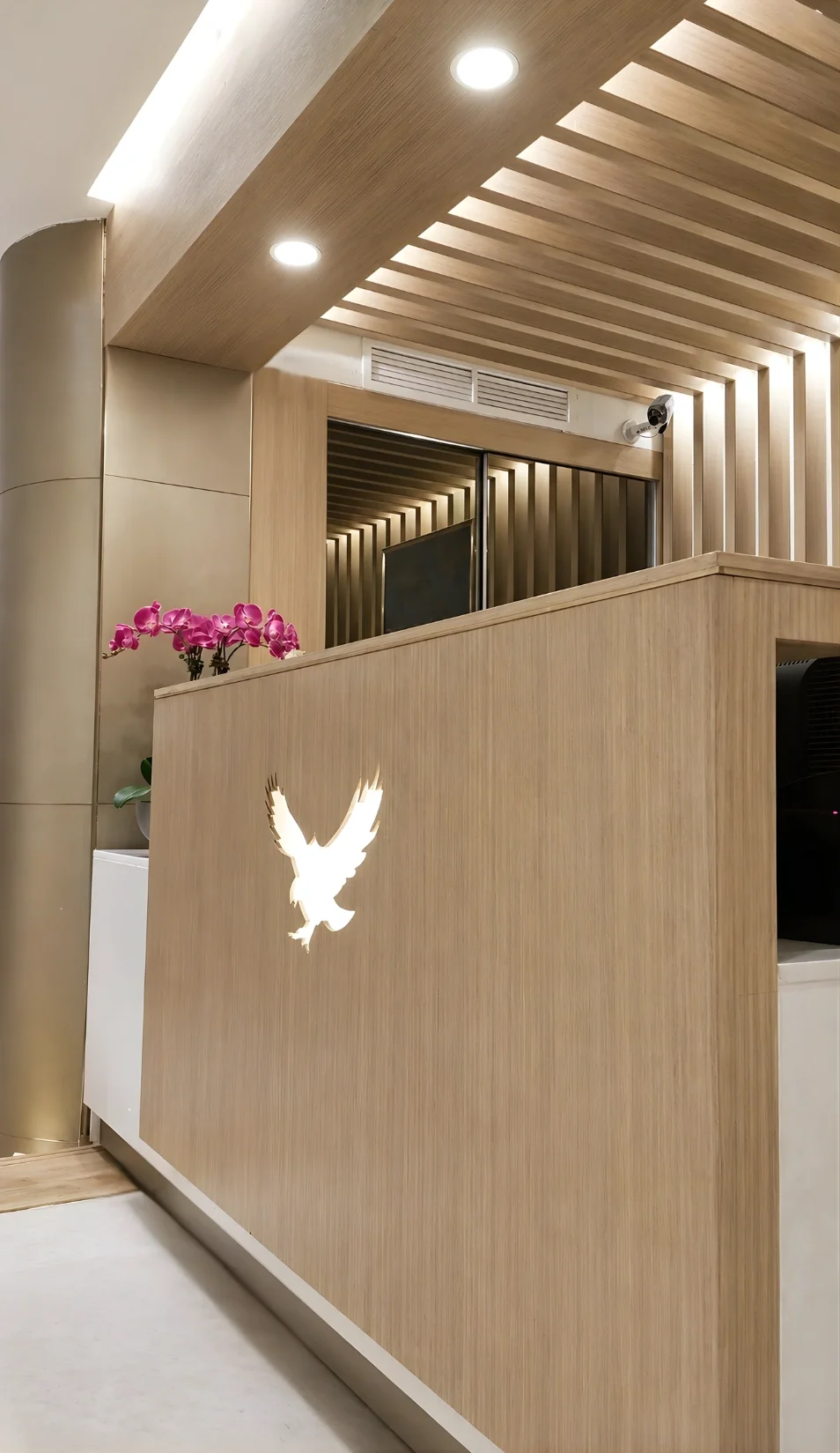 Hotel lobby lighting design at Royal Falcon Hotel in Bur Dubai highlighting layered ceiling details and ambient illumination