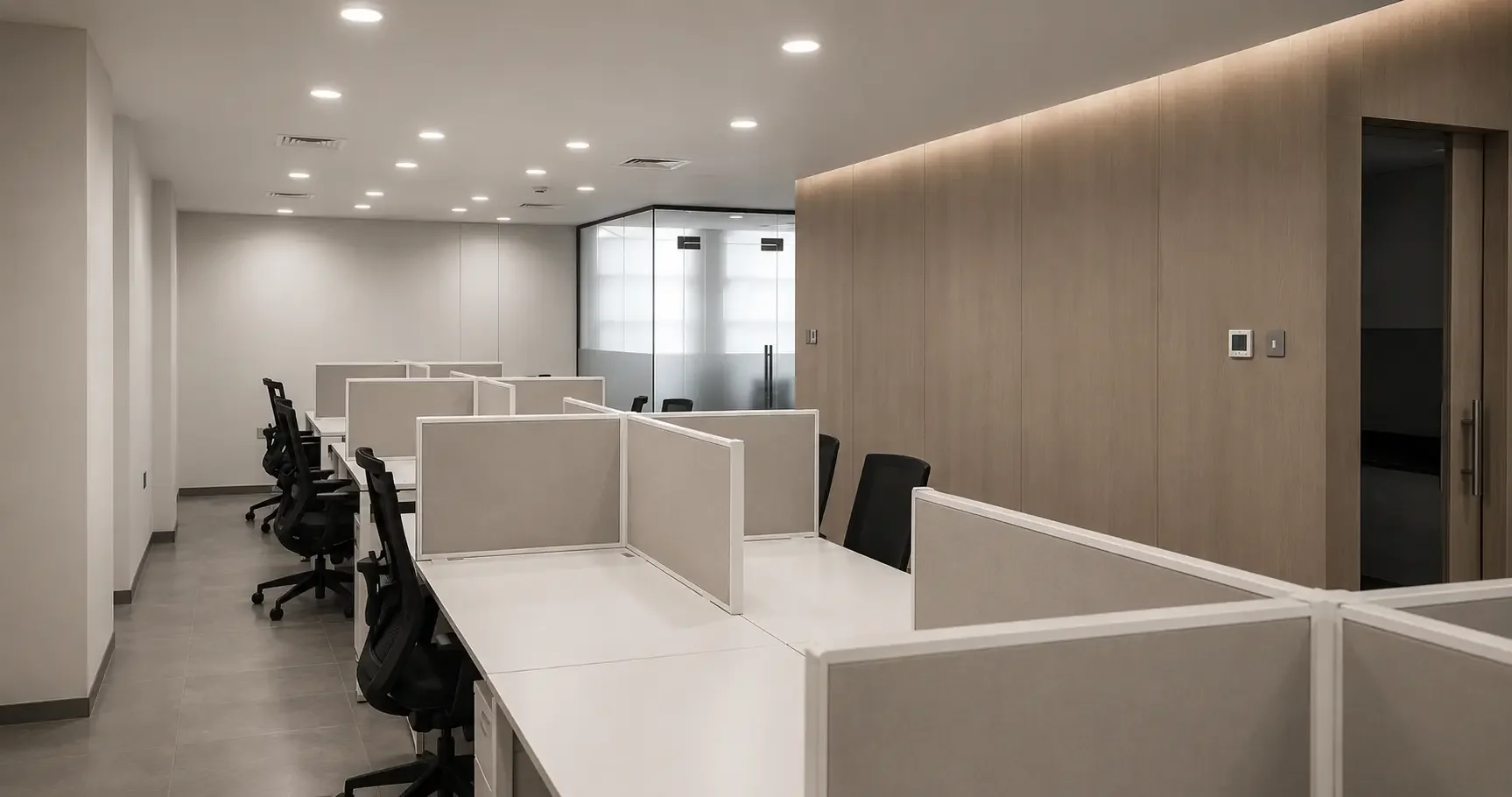 Modern office workstation design for Shurooq Sharjah with open layout, glass partitions, and efficient workspace planning