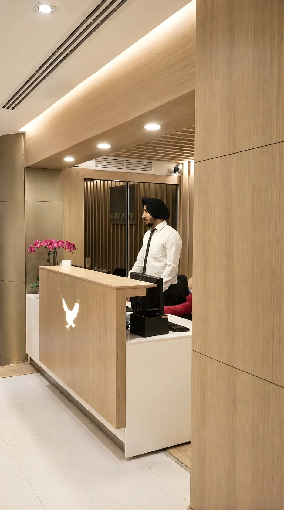 Refined hotel lobby seating area at Royal Falcon Hotel Bur Dubai with soft neutral finishes and contemporary furniture layout