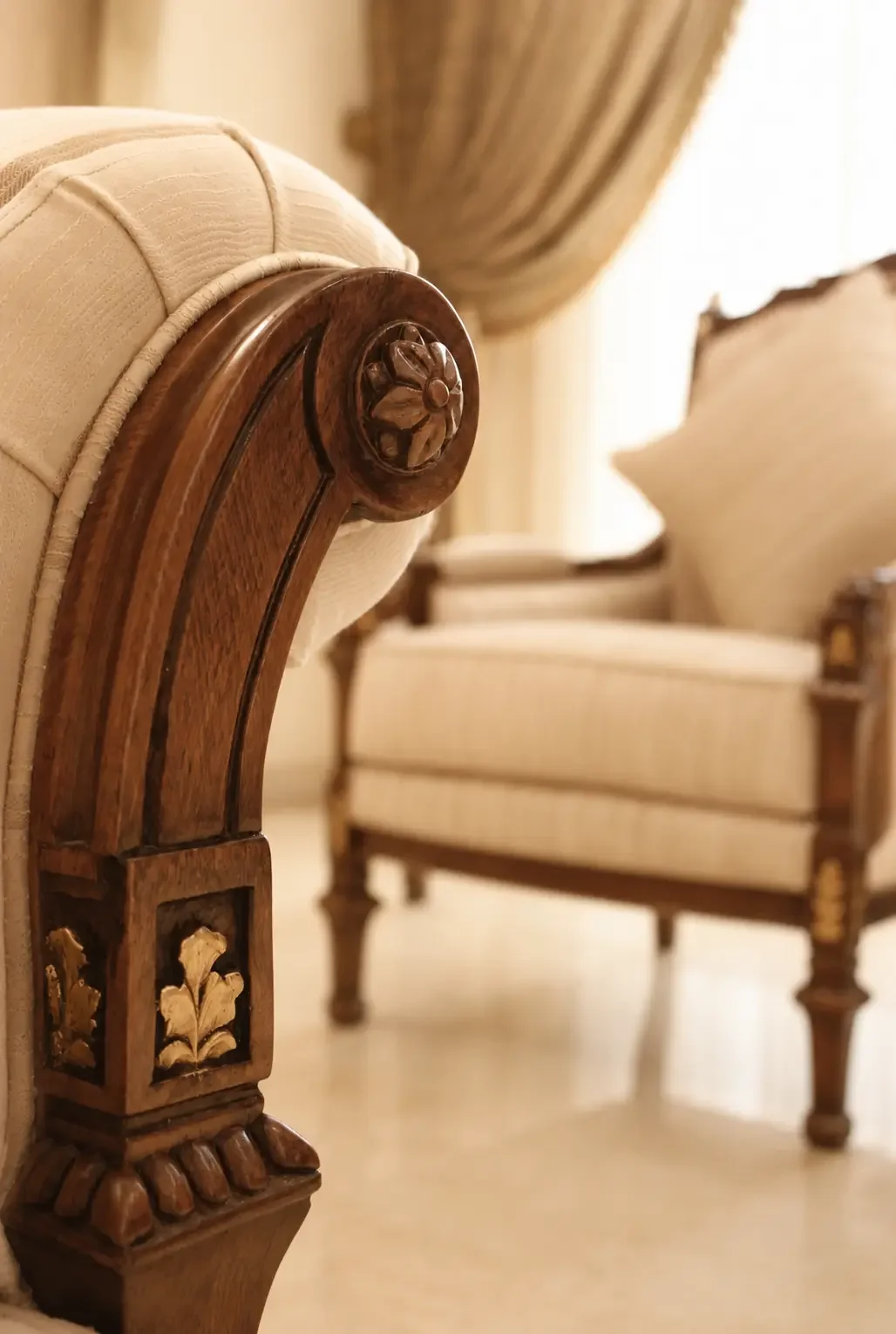 Close-up of custom semi-classical furniture detailing with carved wood accents and upholstered seating in a Sharjah villa.