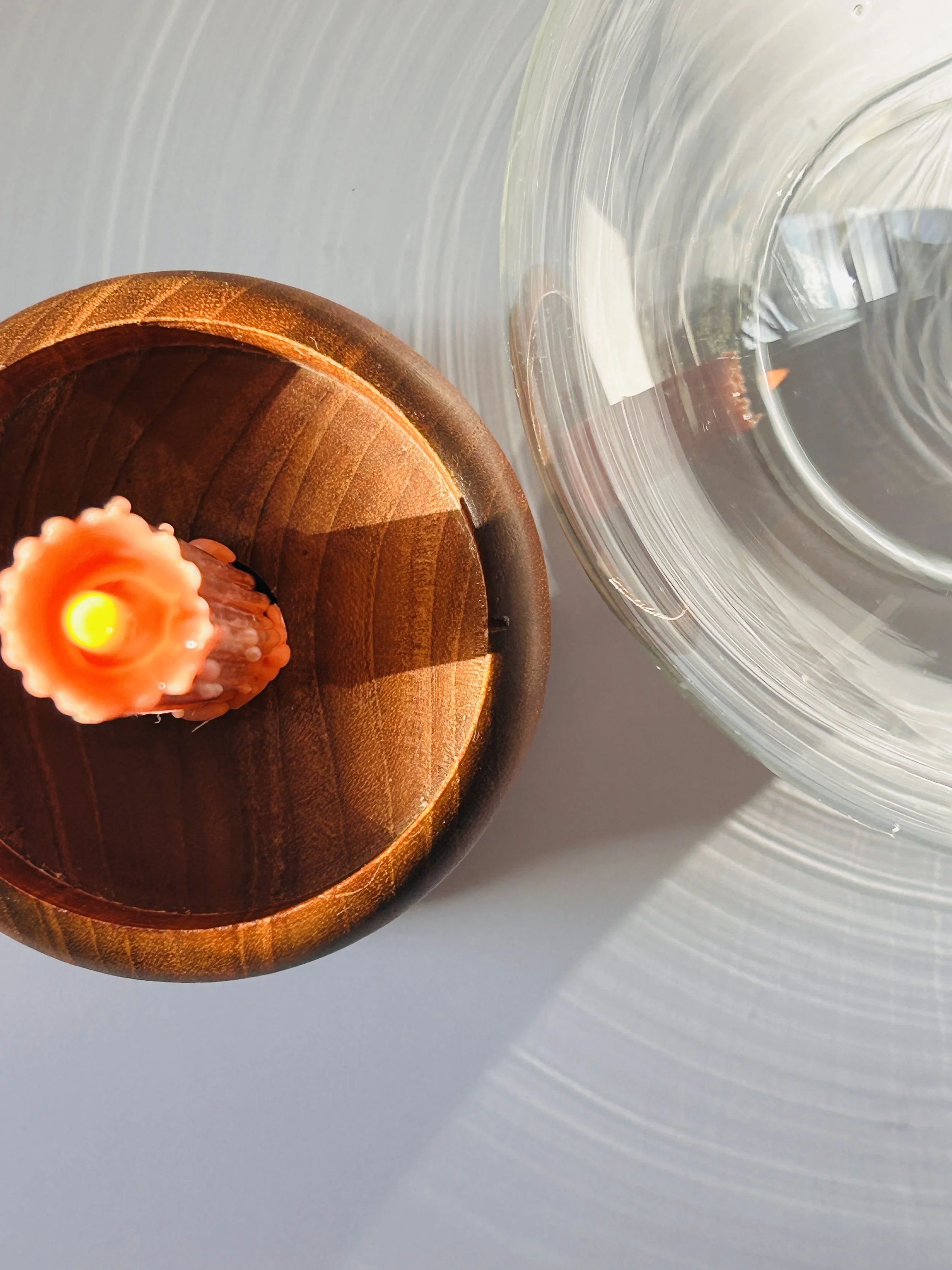 Mid-century glass hurricane candle holder with wooden base and taper candle, sculptural modern decor