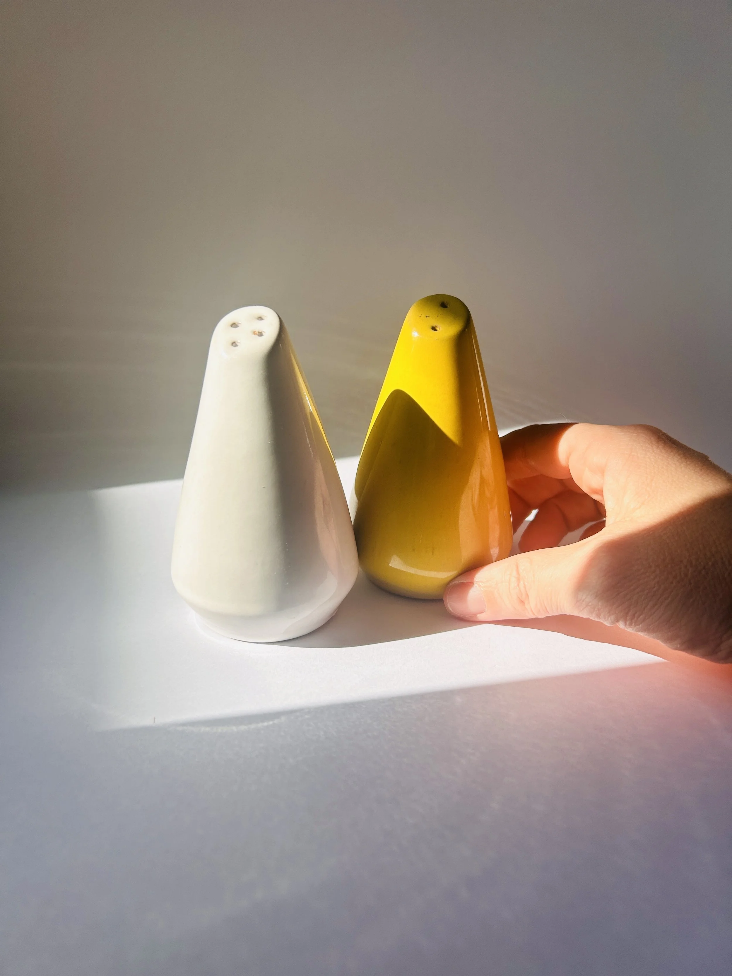 Vintage Frankoma Westwind ceramic salt and pepper shakers with yellow and white glaze, mid-century design