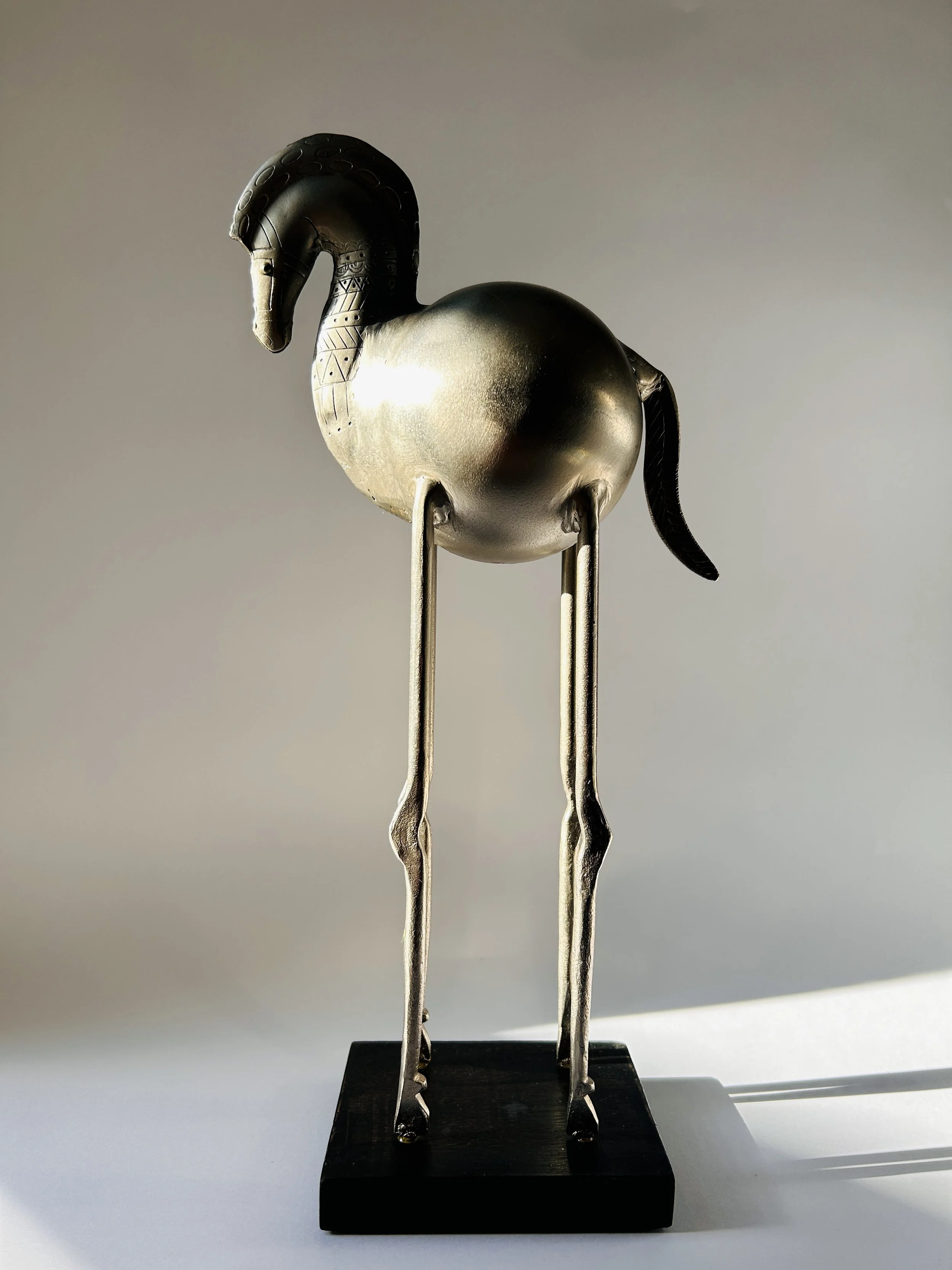 Pair of Bertil Bernhardt fat horse sculptures in silver with long legs, mid century modern Scandinavian decor