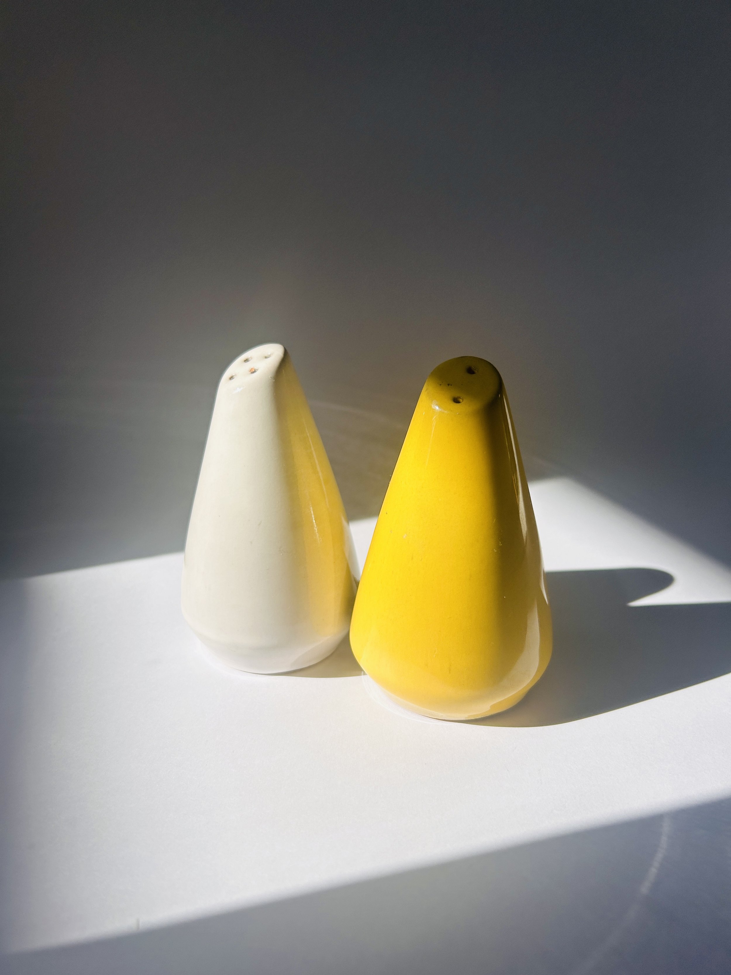 Vintage Frankoma Westwind ceramic salt and pepper shakers with yellow and white glaze, mid-century design