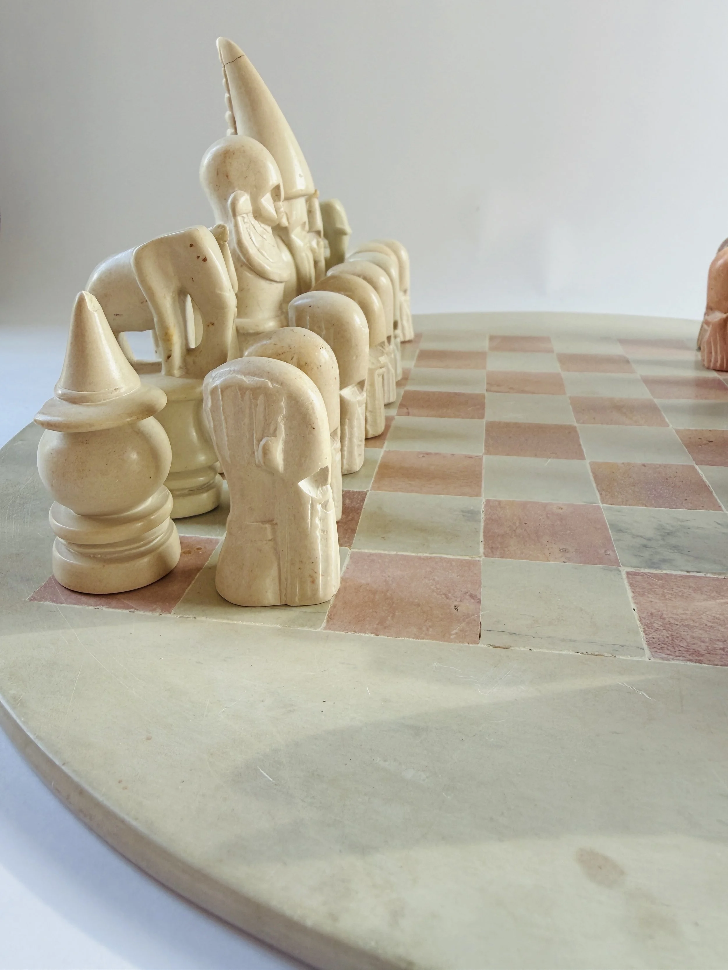 hand carved soapstone chess set with stone board and sculptural pieces
