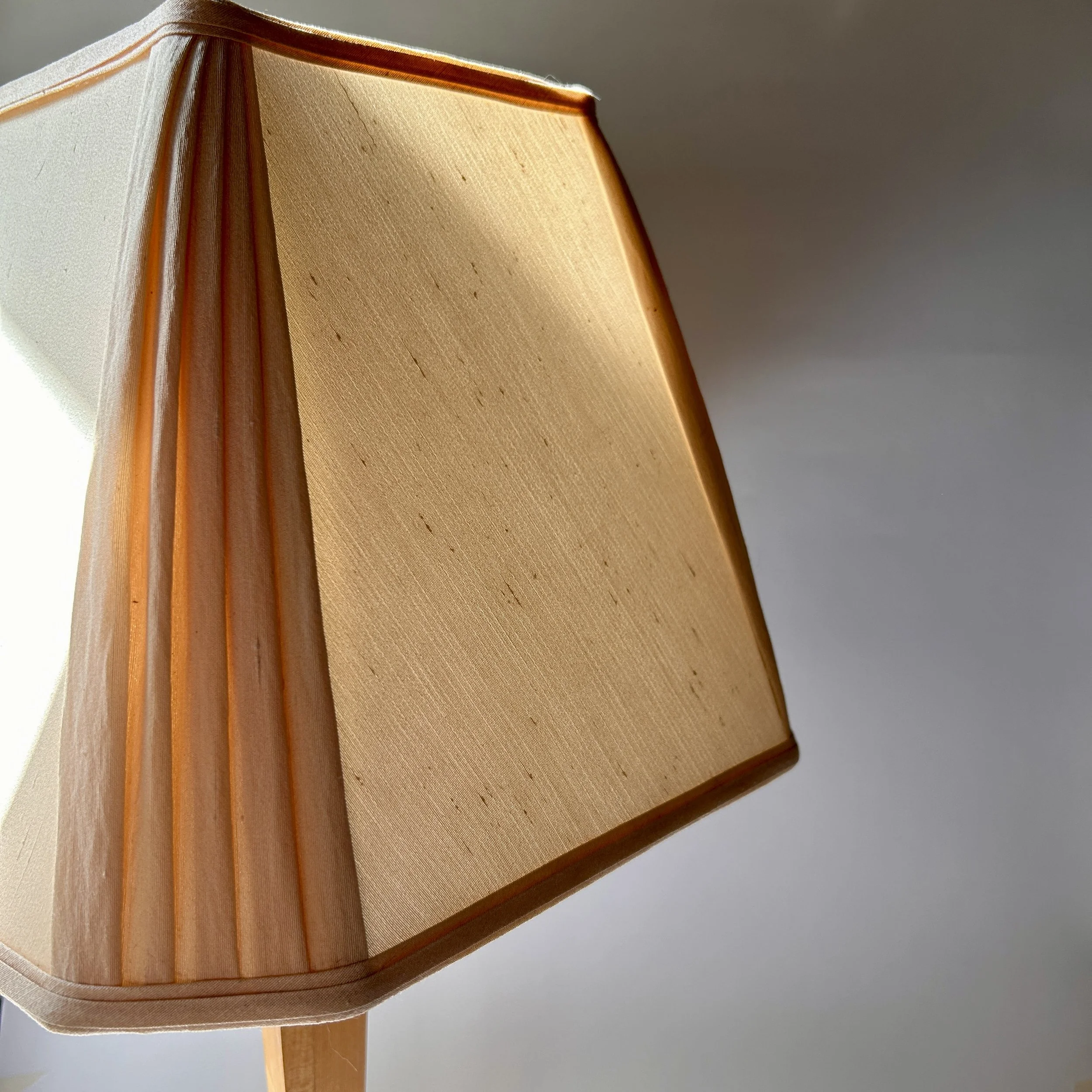 Vintage minimalist wooden table lamp with tapered geometric column, square wood base, and warm ivory raw silk shade.