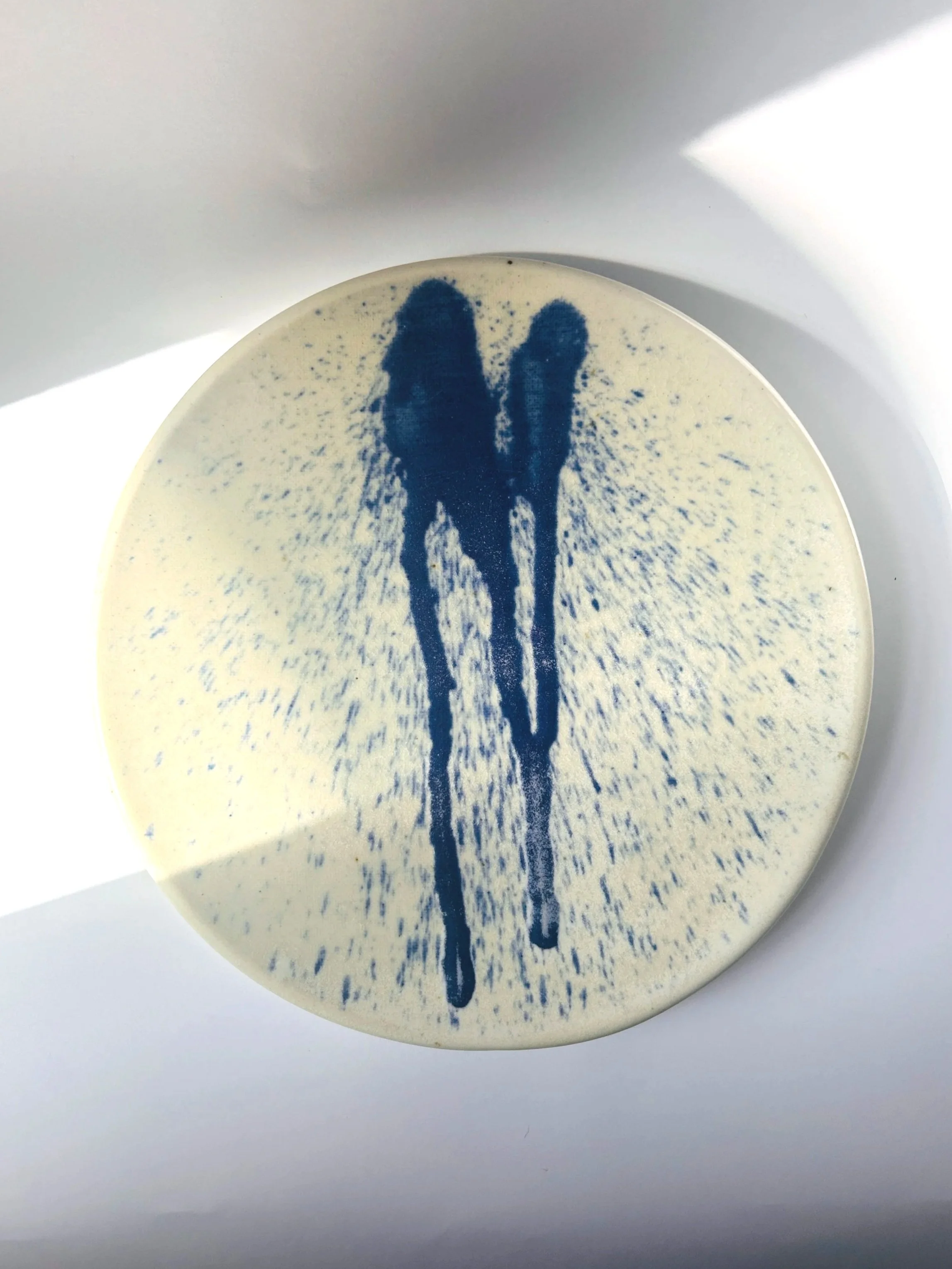 Abstract ceramic pedestal plate with blue drip glaze, handcrafted studio pottery dish