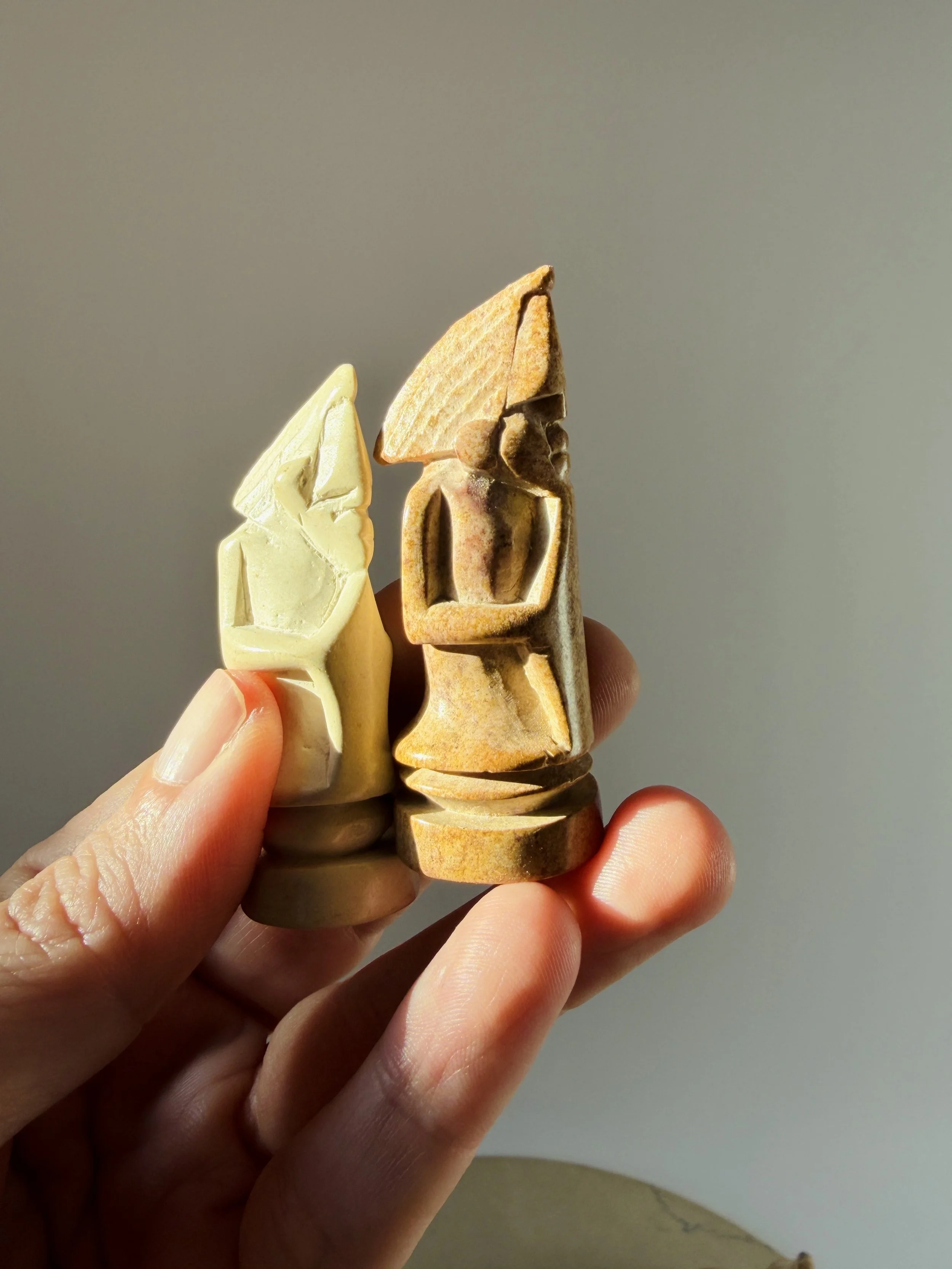 hand carved soapstone chess set with stone board and sculptural pieces bishop