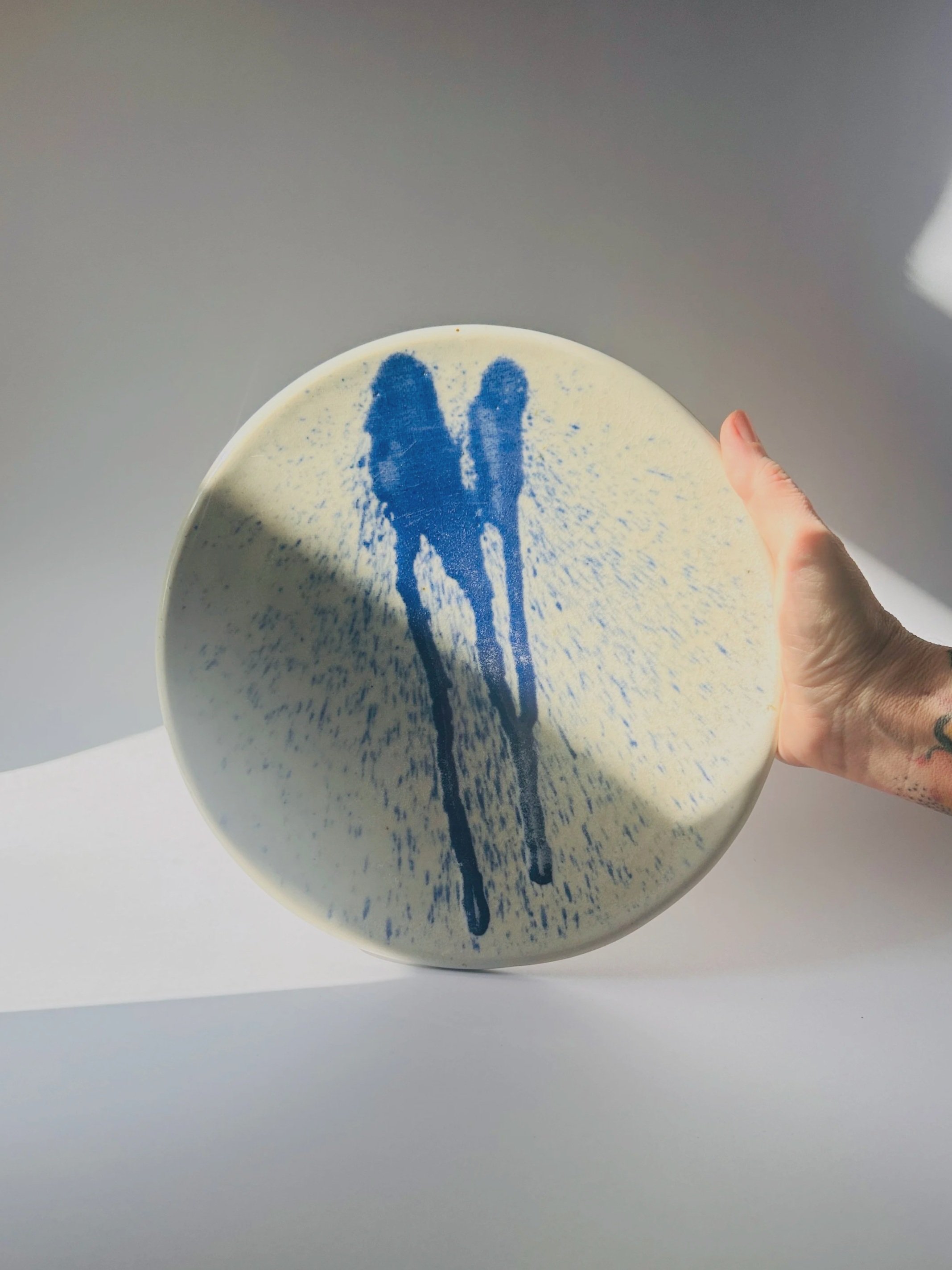 Abstract ceramic pedestal plate with blue drip glaze, handcrafted studio pottery dish