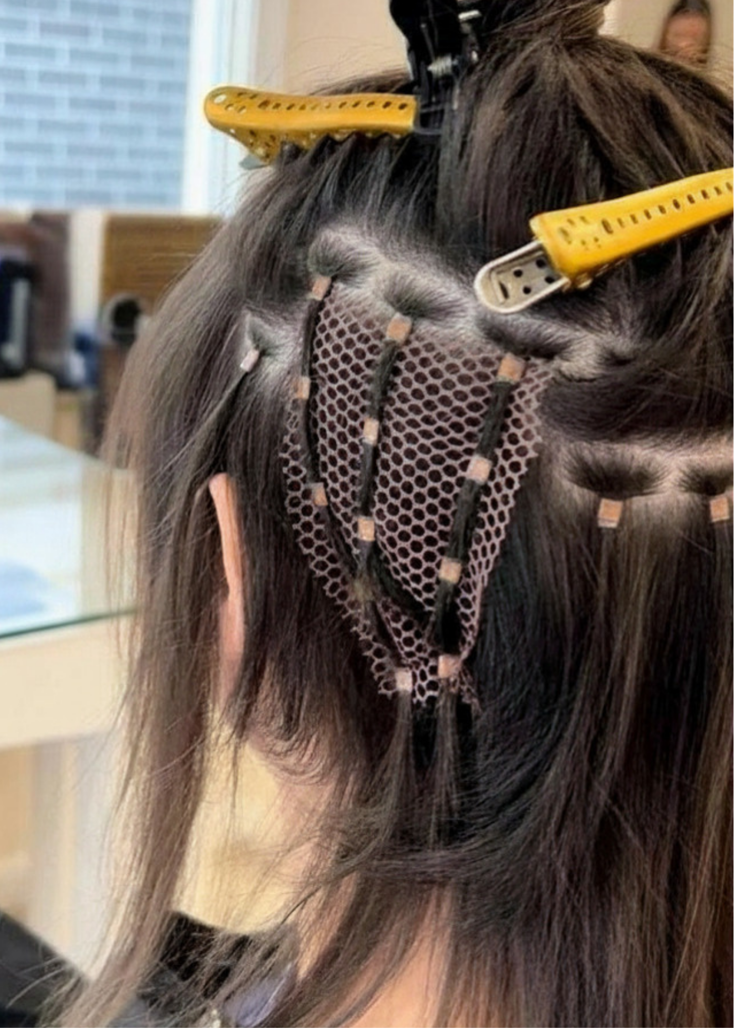 Custom mesh integration providing natural-looking coverage for thinning hair and reduced density.