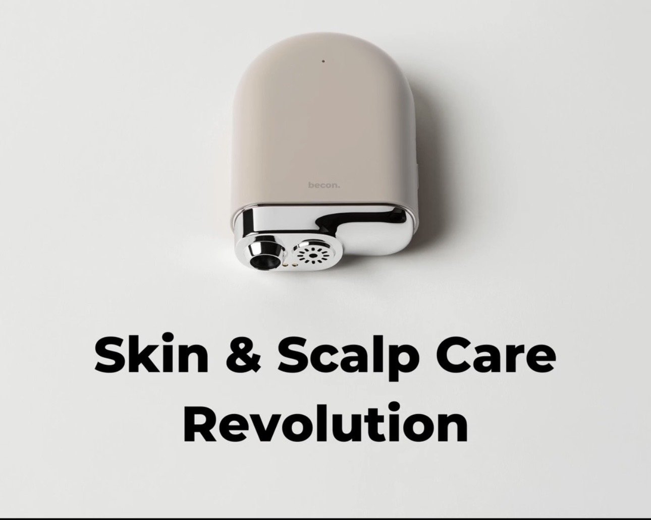 A beige and silver handheld device with a black nozzle and spray hole on a white background, with the text 'Skin & Scalp Care Revolution' beneath it.