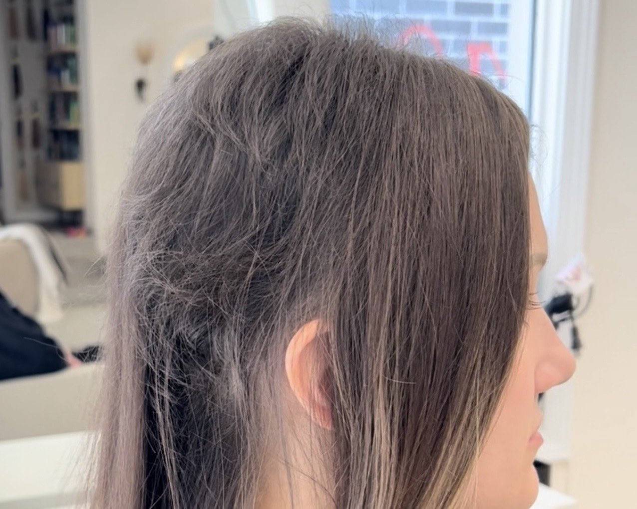 Hair enhancement solutions for women experiencing thinning hair and hair loss.