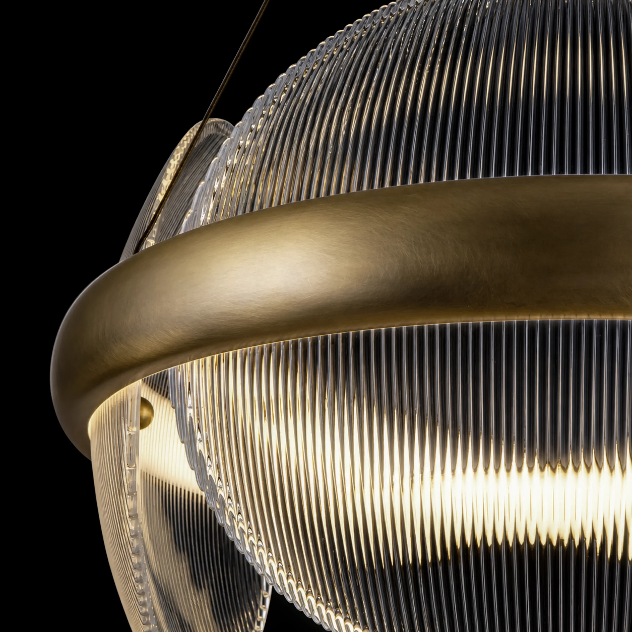 Close up view on the Taurus ribbed glass pendant designed by Alan Pepin