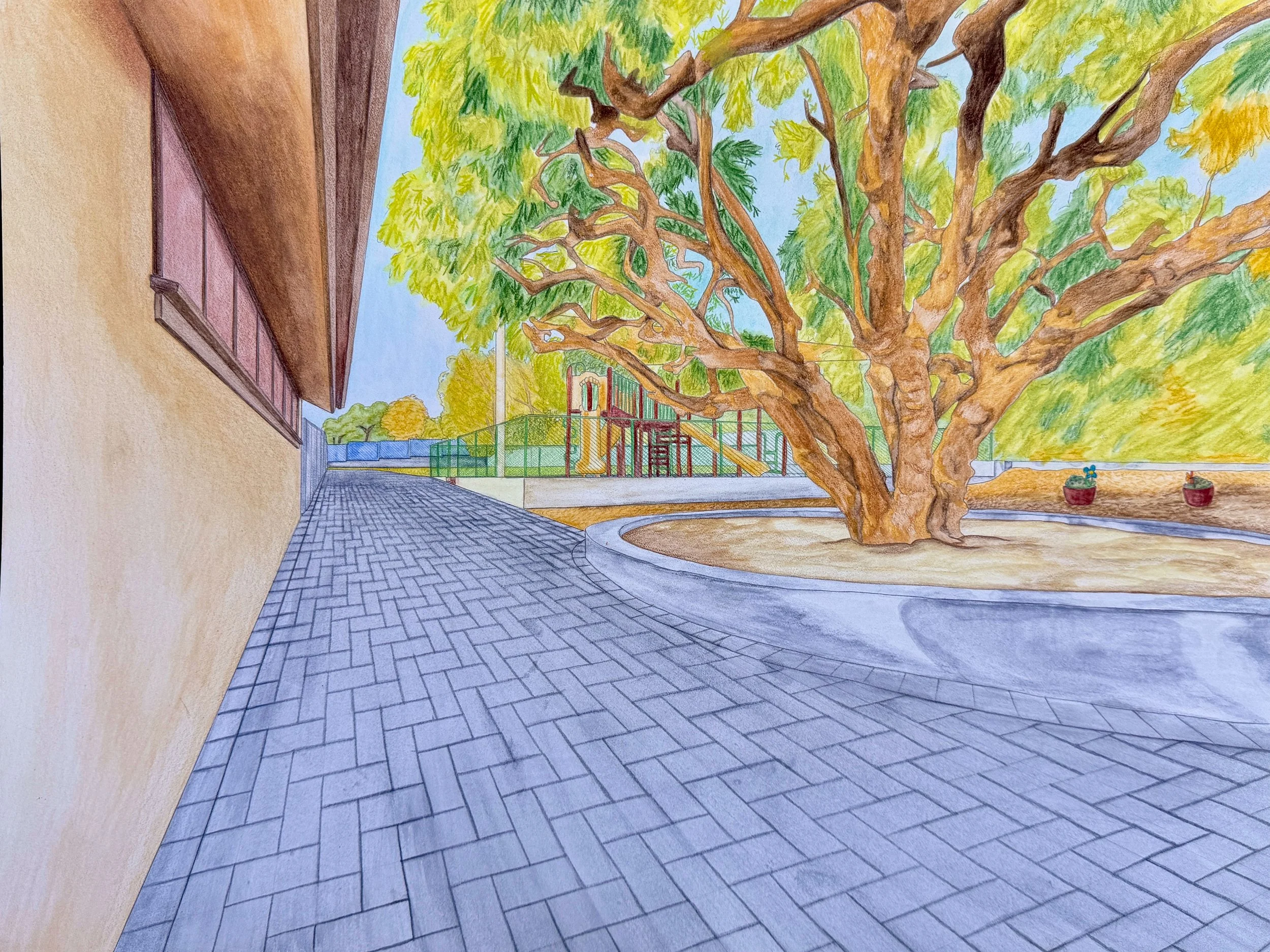 Colorful drawing of an outdoor scene with a large tree, playground equipment, and a paved walking path, adjacent to a building with pink windows.