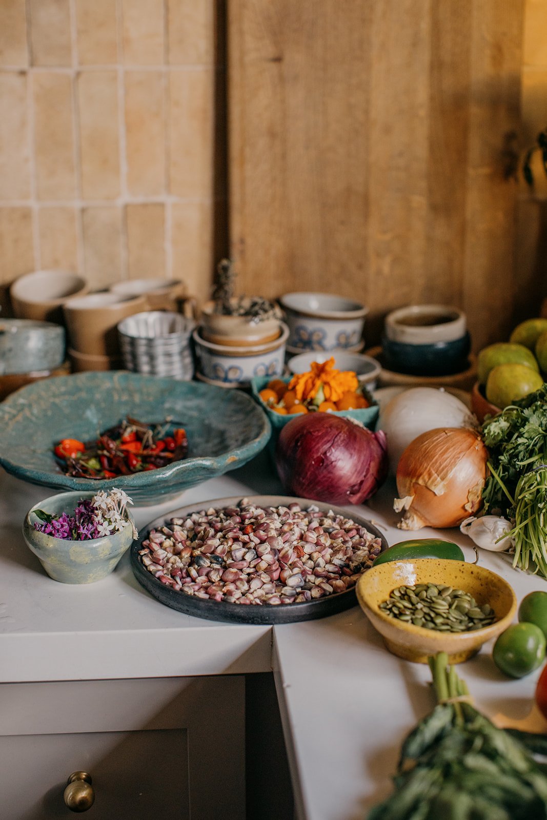 Mexican spices in bowls on counter