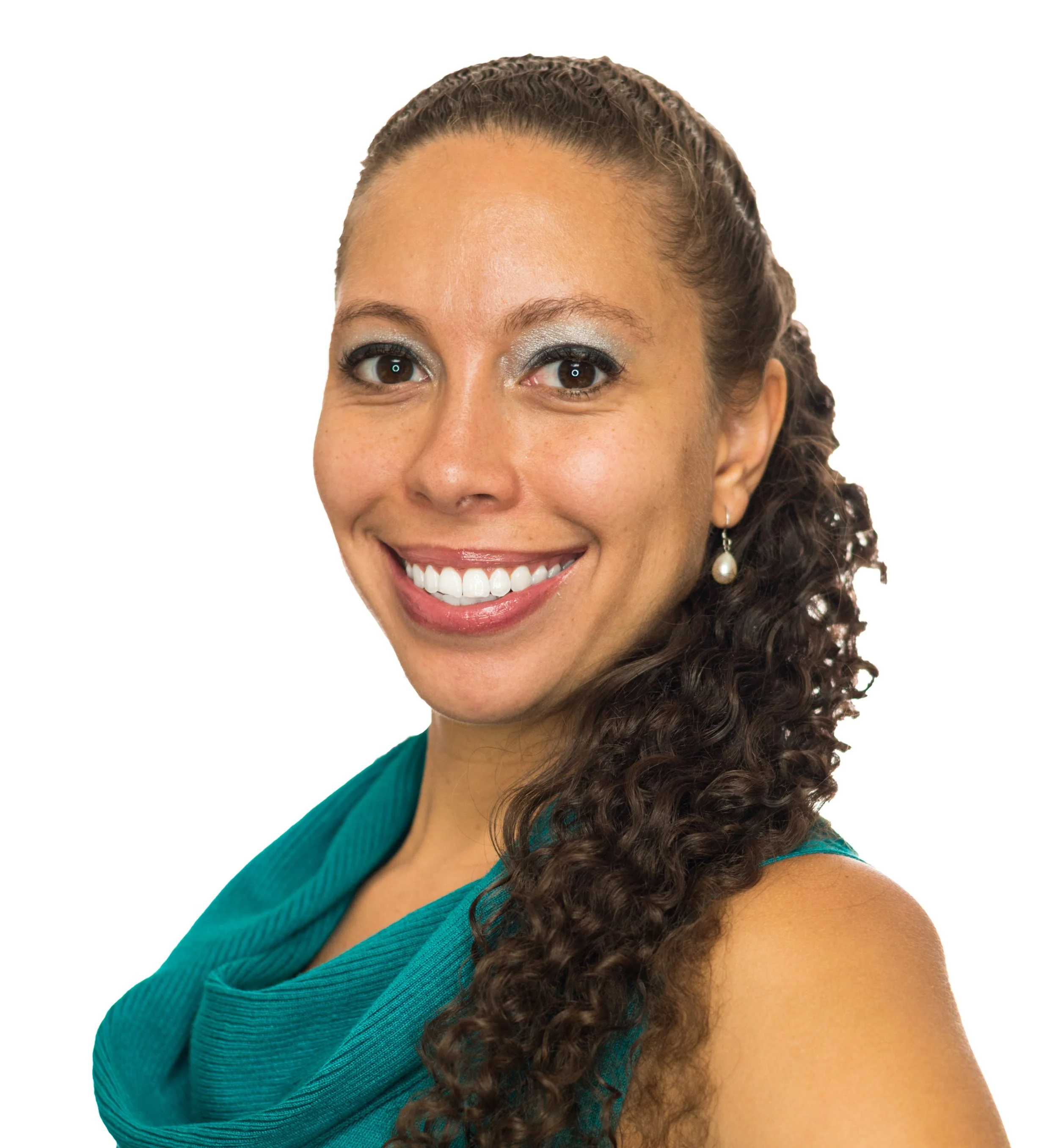 Portrait of a smiling woman with curly hair, wearing a teal sleeveless top and pearl earrings, against a white background. CEO, Heather Rhoden.