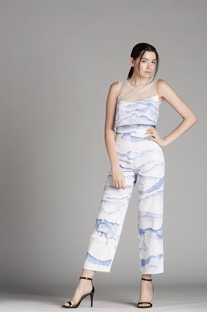 Immersion is a collection inspired by memories and movement, translating ocean like textures into layered prints and garments. Through hand drawn wave motifs and textile exploration, the collection focuses on creating depth and softness across each p