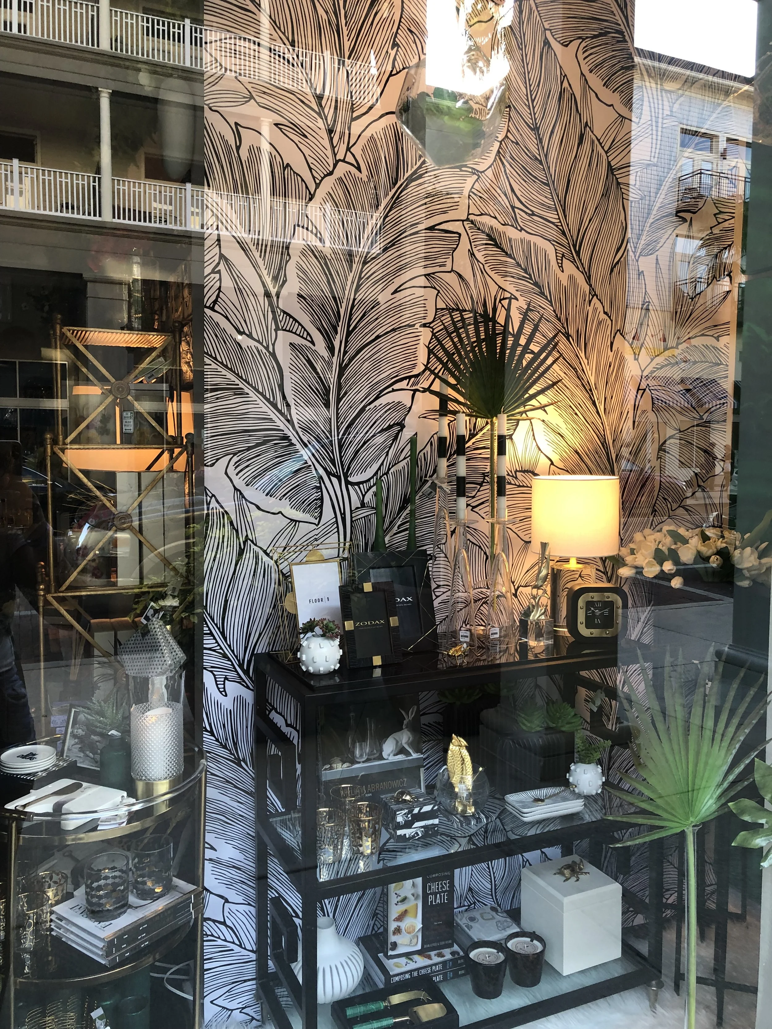 Inspired by a window display in Orlando FL, I recreated a similar pattern on my bedroom wall using black acrylic paint.