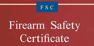 Firearm safety certificate sign with blue FSC label on red background.